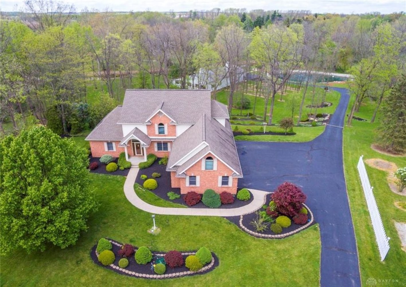 PHOTOS: Nearly 10-acre Miami County property listed has luxury home, stocked fishing pond