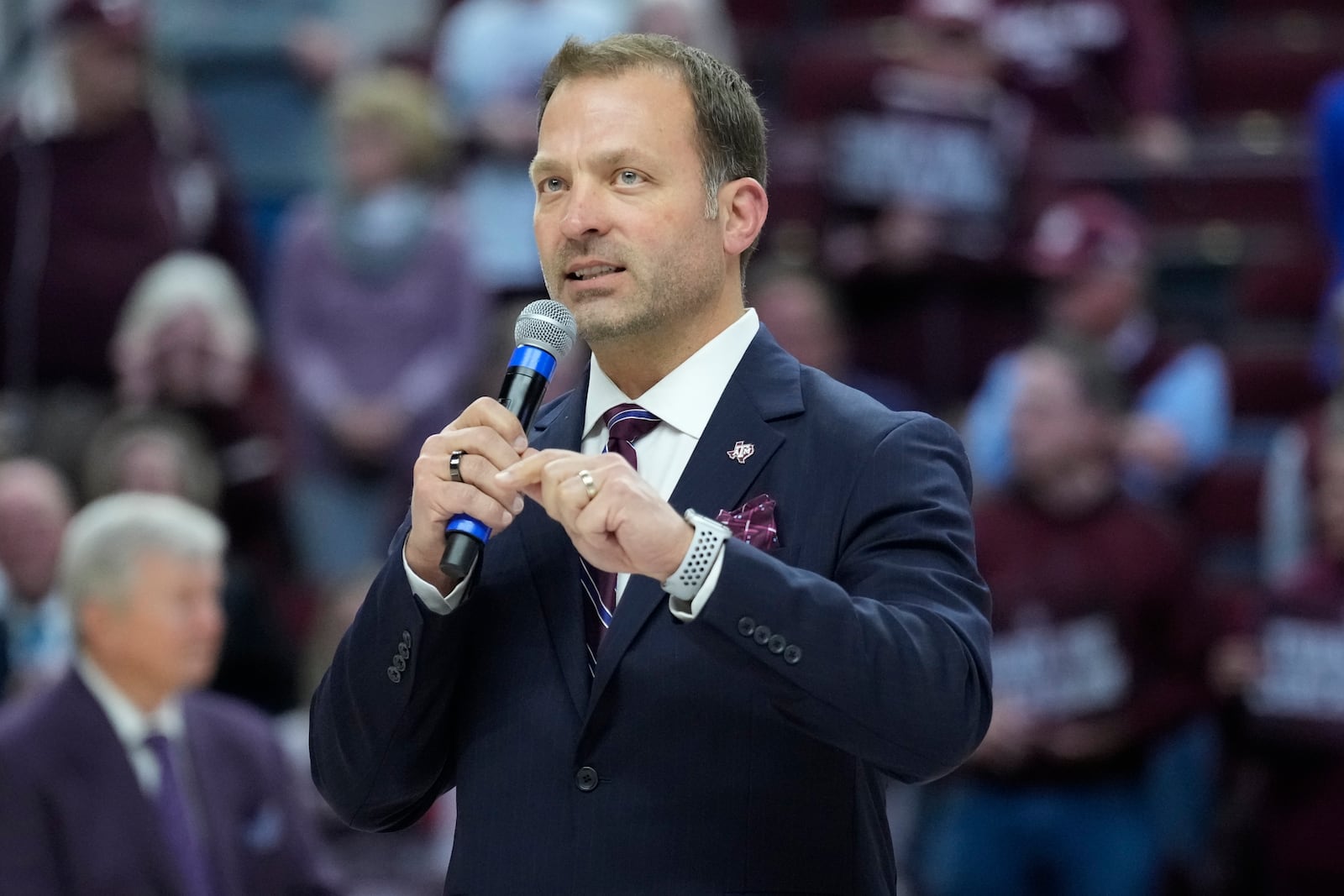 FILE - Texas A&M Athletic Director Ross Bjork speaks to the crowd at Reed Arena after an NCAA college basketball game, Feb. 24, 2022, in College Station, Texas. (AP Photo/Sam Craft, File)