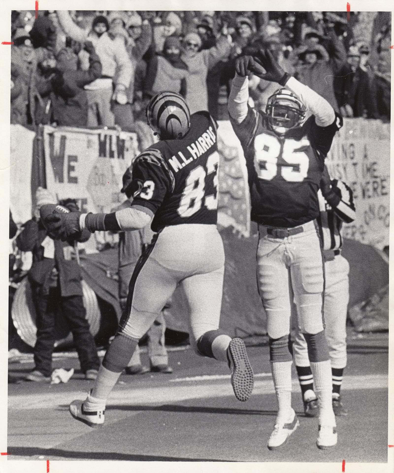 Bengals tight end M.L. Harris celebrates a first-quarter touchdown with teammate Isaac Curtis during the AFC championship game, Jan. 10, 1982. Harris' only catch of the game put Cincinnati ahead 10-0. Photo courtesy of DDN Collection at Wright State University Special Collections & Archives