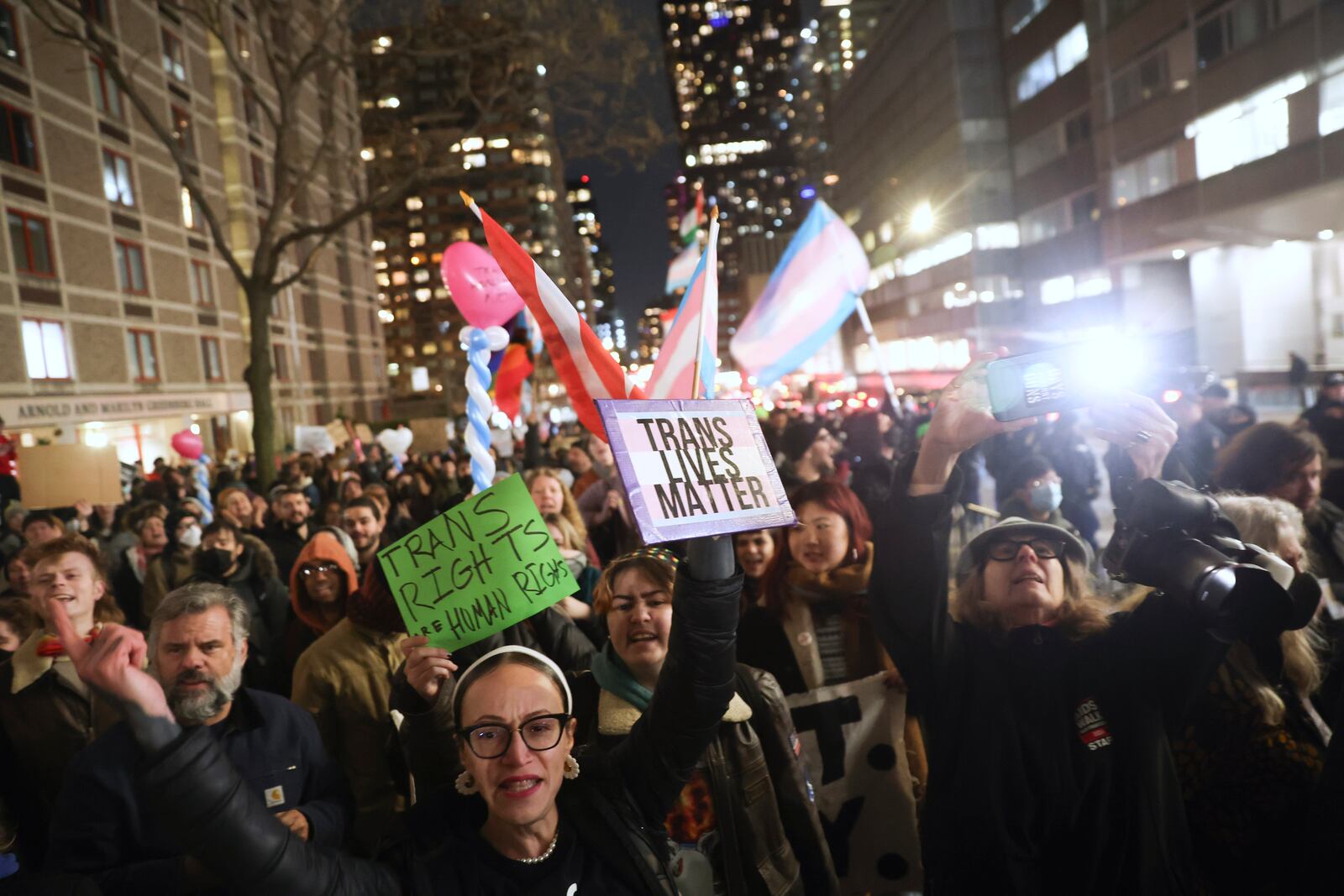 The crowd marches during a rally demanding that NYU Langone commit to providing gender-affirming care for transgender youth following an executive order by President Donald Trump aimed at cutting federal funding, Monday, Feb. 3, 2025, in New York. (AP Photo/Heather Khalifa)