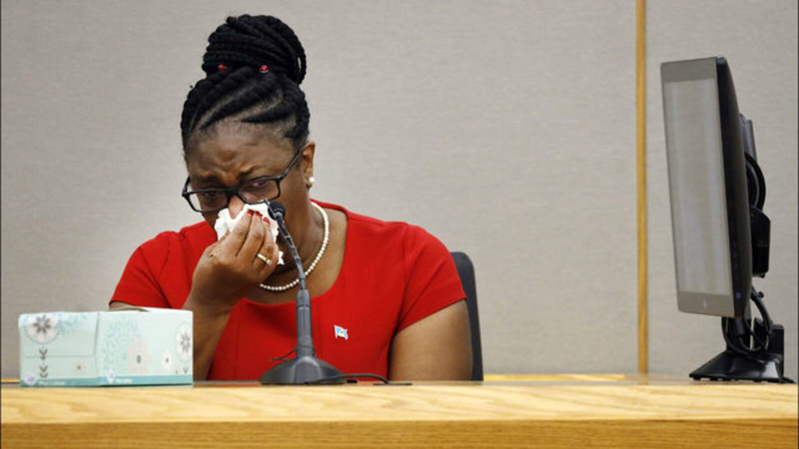 Allison Jean weeps as she testifies Tuesday, Oct. 1, 2019, about her son, Botham Jean, who was gunned down in September 2018 by his neighbor, Amber Guyger, who was a Dallas police officer at the time. Guyger was convicted Tuesday of murder.