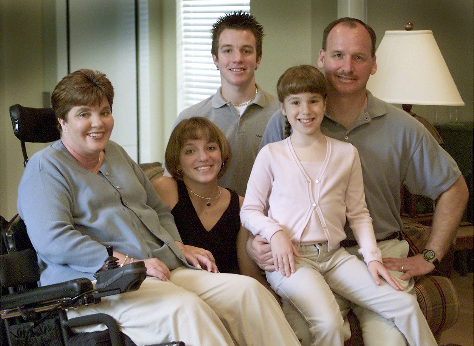 The Beall family was photographed together in their family room  on May 7, 2002, by Skip Peterson.
From left, Mary, Vanessa, Ian, Maddie and John.