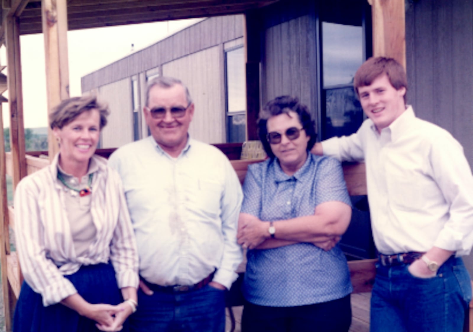 Your author on the right, my mother on the left; Floyd and Carrie Workman in the middle