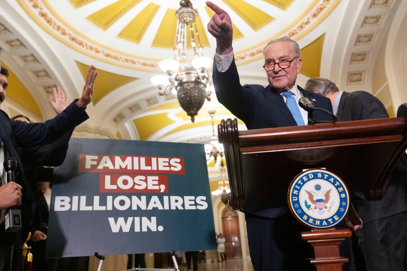 Senate Minority Leader Chuck Schumer of N.Y., calls on a reporter, Wednesday, Feb. 19, 2025, after a Senate policy luncheon on Capitol Hill in Washington. (AP Photo/Jacquelyn Martin)