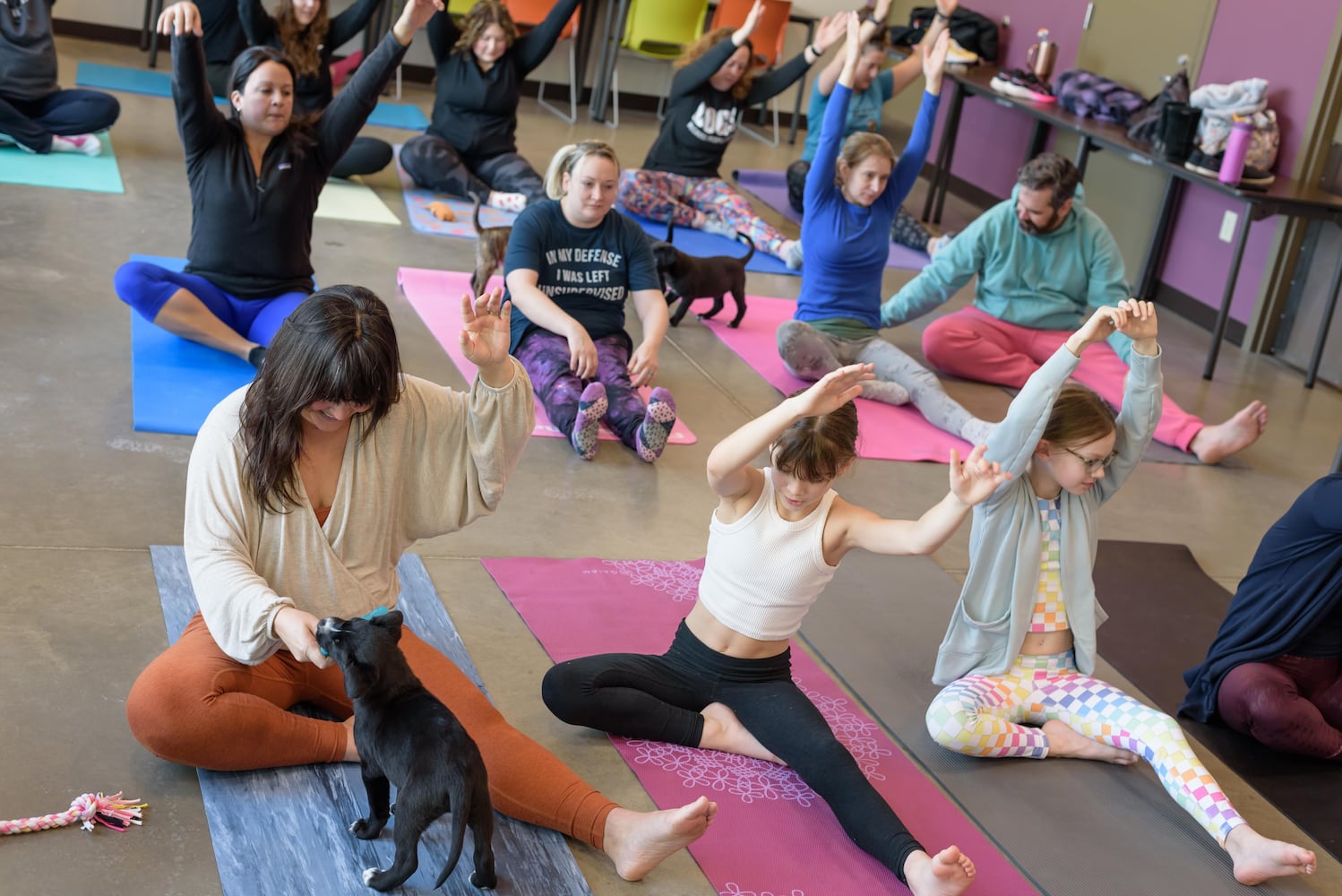 PHOTOS: Puppy Yoga at SICSA Pet Adoption and Wellness Center