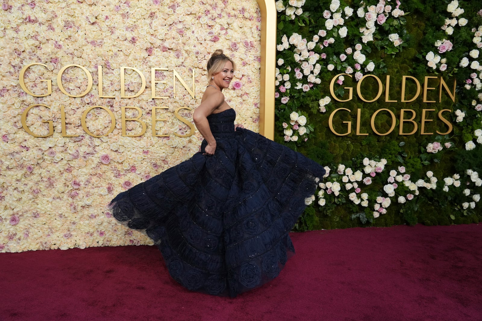 Kate Hudson arrives at the 82nd Golden Globes on Sunday, Jan. 5, 2025, at the Beverly Hilton in Beverly Hills, Calif. (Photo by Jordan Strauss/Invision/AP)