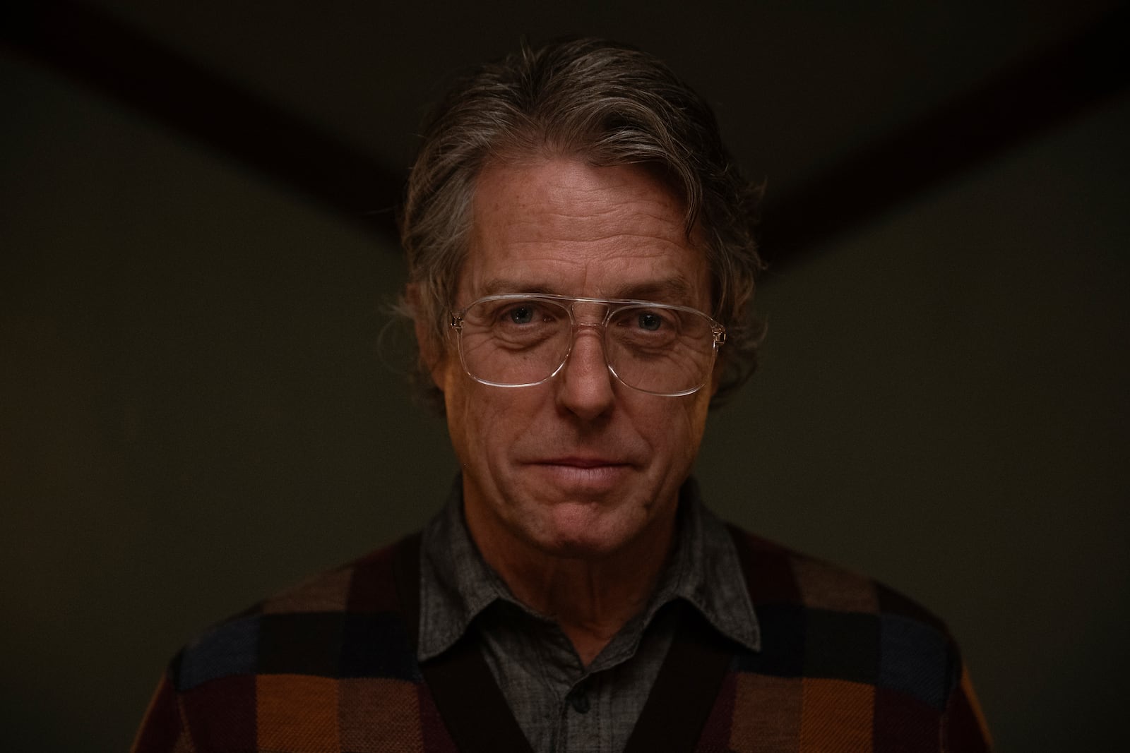 This image released by A24 shows Hugh Grant in a scene from "Heretic." (Kimberley French/A24 via AP)