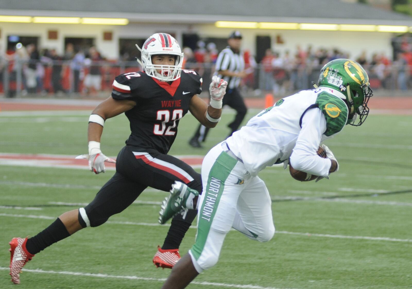 Wayne’s Jaden Hurd (left) chases Jazz Keys of Northmont. Wayne defeated visiting Northmont 49-20 in a Week 5 high school football game on Friday, Sept. 21, 2018. MARC PENDLETON / STAFF