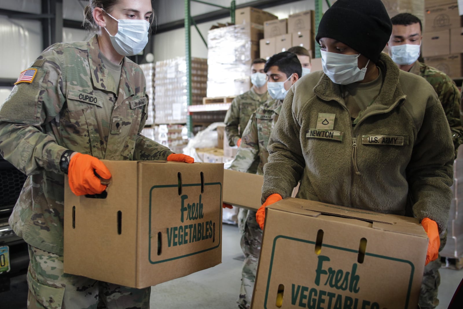 Members of the Ohio National Guard were on hand helping the Dayton Foodbank distribute goods on Monday, March 23, 2020. 

The pantry is open from 1 to 3 p.m. on Monday, Wednesday and Friday at 56 Armor Place in Dayton.

Staff photo by Jim Noelker