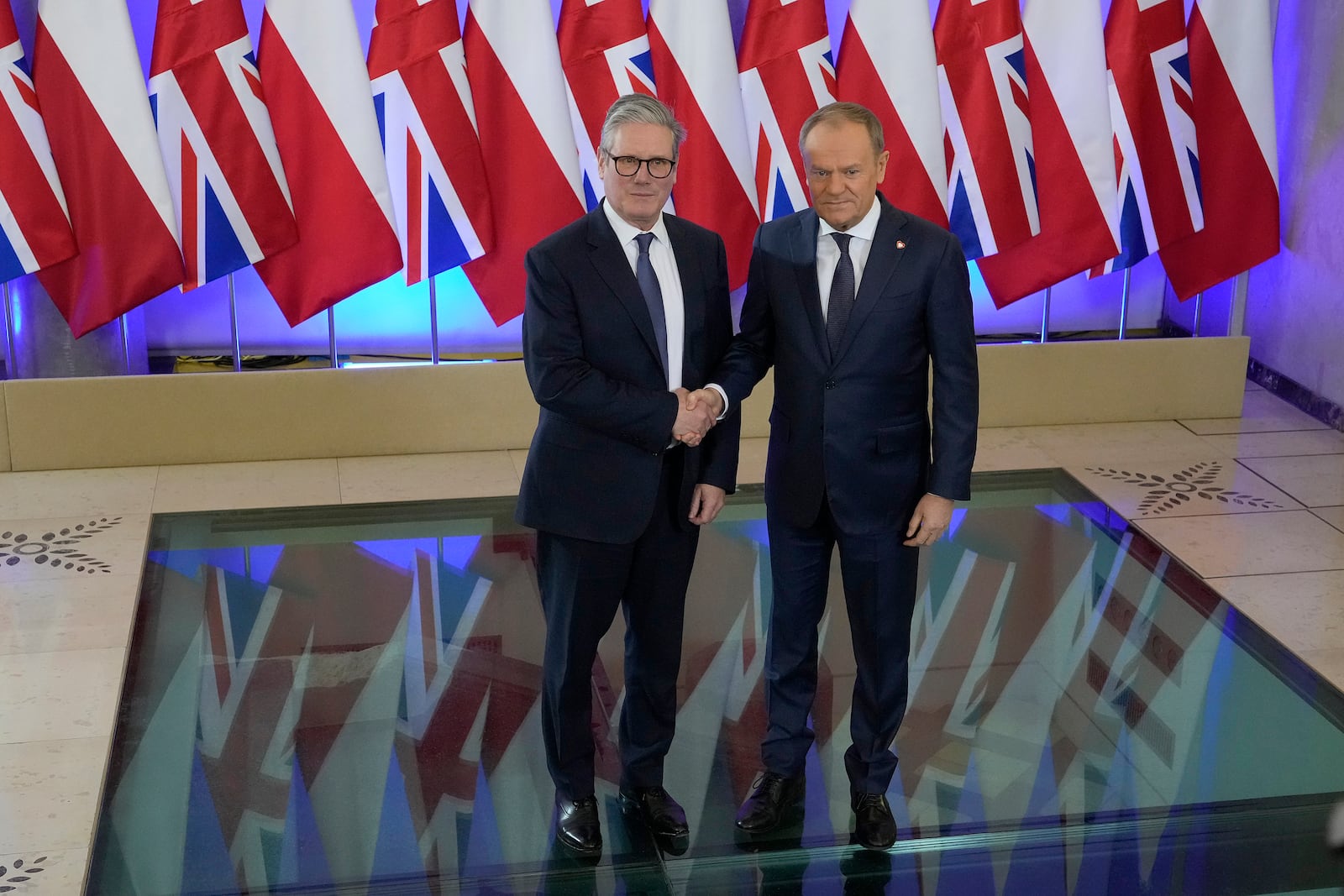 Britain's Prime Minister Keir Starmer meets Polish Prime Minister Donald Tusk, right, in Warsaw, Friday, Jan. 17, 2025. (AP Photo/Czarek Sokolowski)