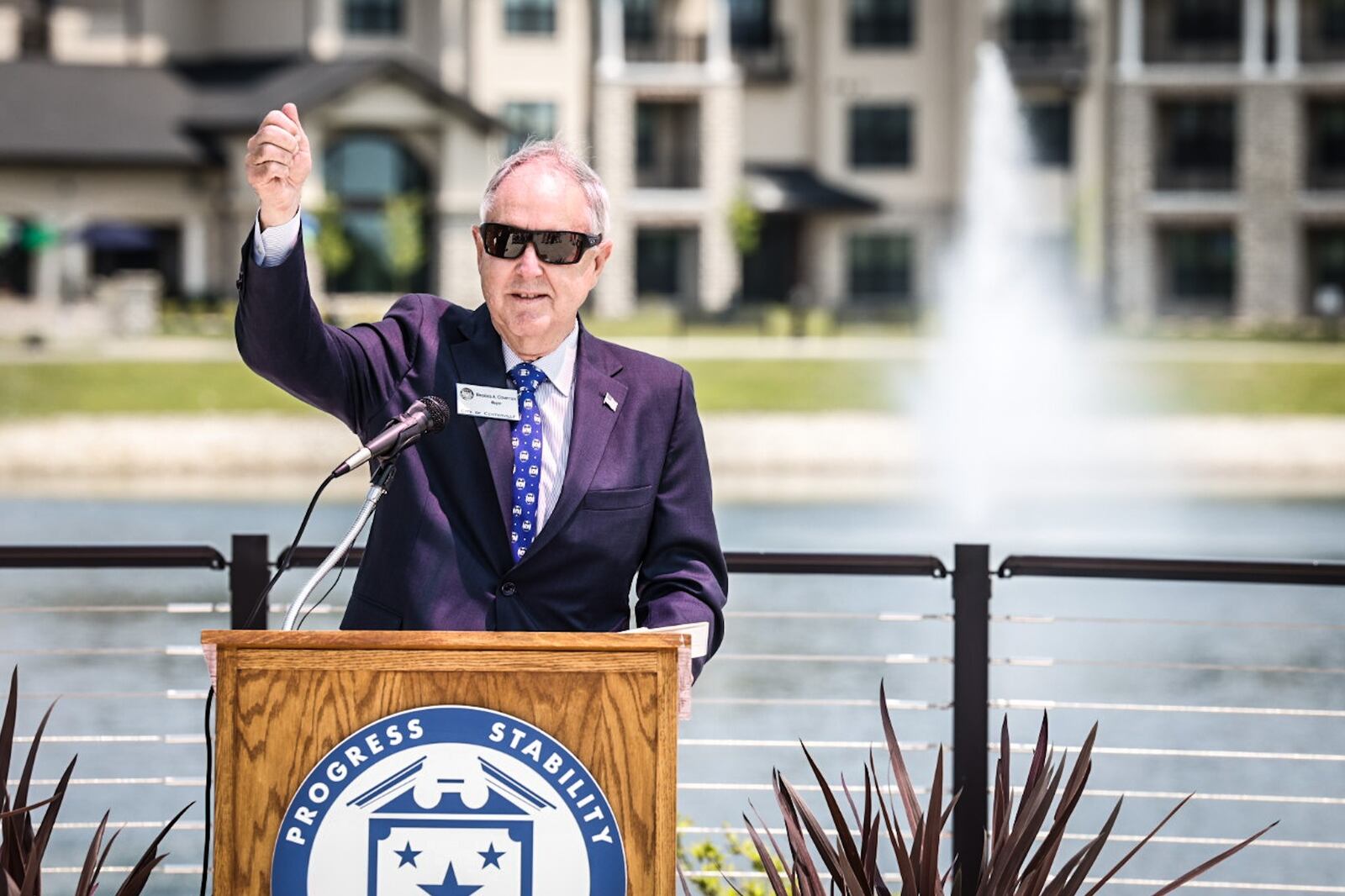 Centerville Mayor Brooks Compton toasts the new Cornerstone Park during a dedication ceremony Wednesday, May 17, 2023. The park is located on Cornerstone North Boulevard near Interstate 675 and Feedwire Road. JIM NOELKER/STAFF