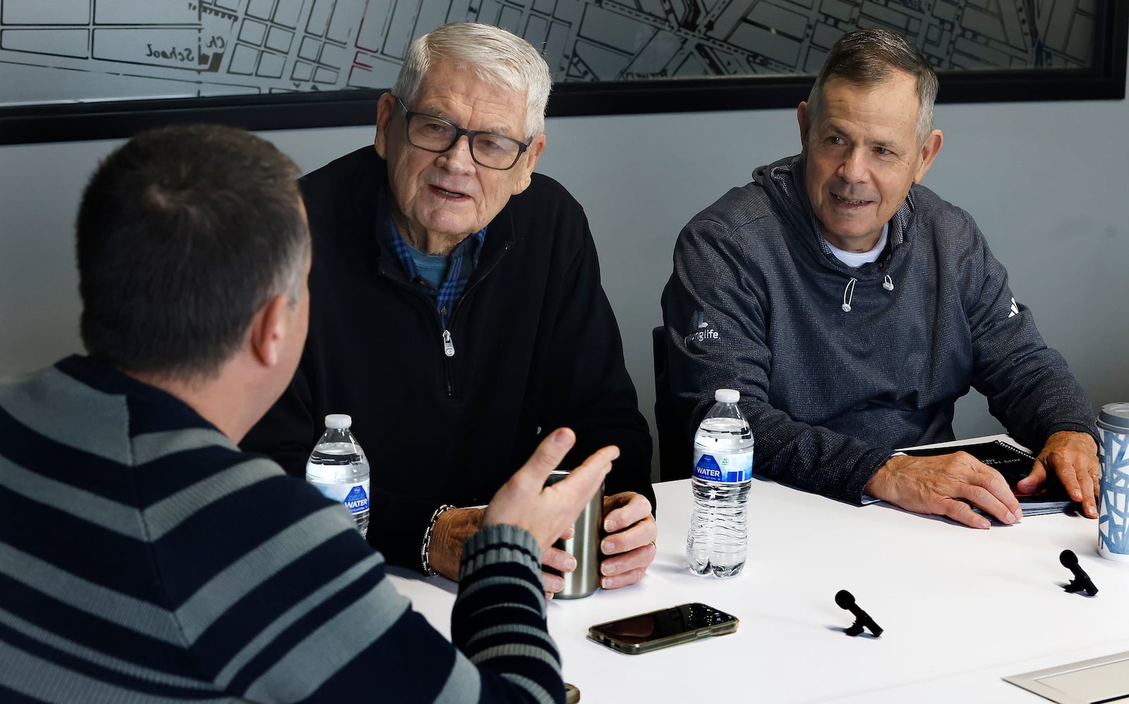 Dayton Flyers beat writer for the Dayton Daily News David Jablonski talks with passed beat writers, Hal McCoy, middle, and Doug Harris at the Dayton Daily News office in Dayton on Thursday, Jan. 23, 2025. MARSHALL GORBY\STAFF