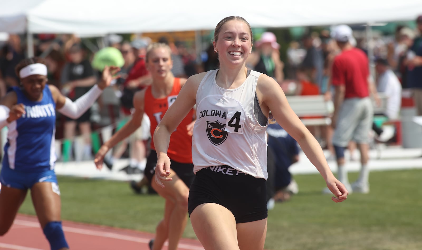 Coldwater's Izzy Zahn reacts after winning a championship in the 200-meter run at the Division III state track meet on Saturday, June 3, 2023, at Jesse Owens Memorial Stadium in Columbus, Ohio. David Jablonski/Staff