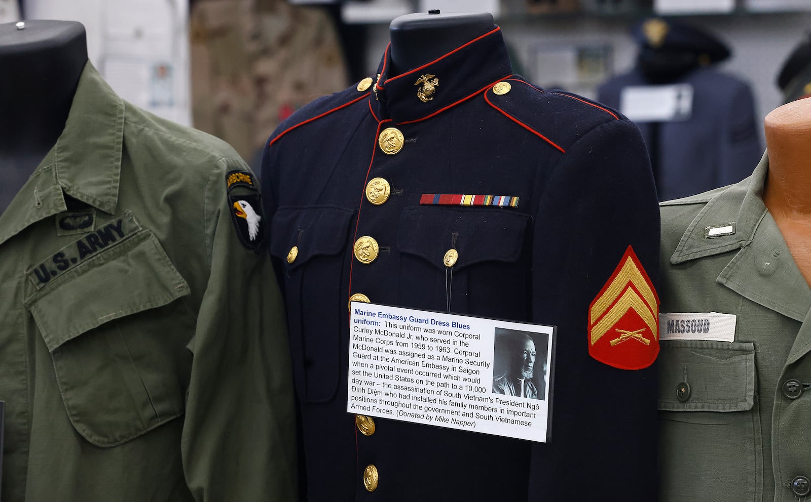 Several military uniforms are on display at the Miami Valley Military History Museum in Fairborn. The museum is planning a event to mark the 50th anniversary to mark the end of the Vietnam War. MARSHALL GORBY\STAFF