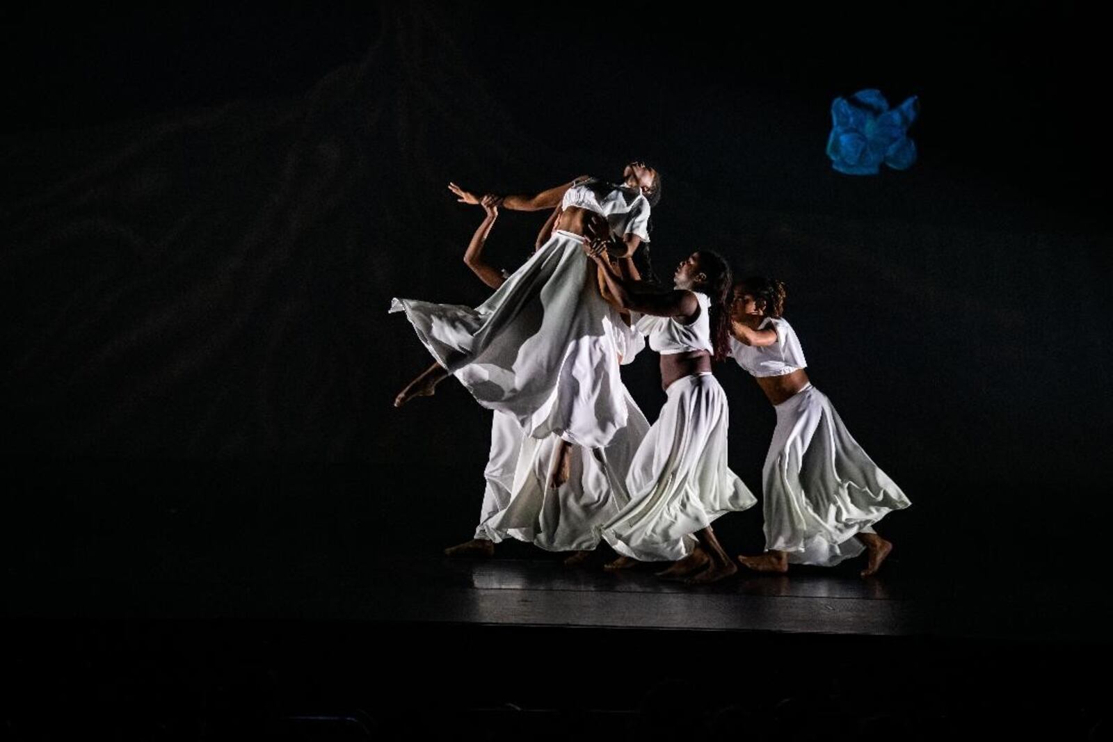 From left: Dancers Qarrianne Blayr, Niarra Gooden-Clarke, Alexandria Flewellen, Nicolay Dorsett and Sadale Warner in "huMAN/NAture," choreographed by Countess V. Winfrey. Photo by Scott Robbins.