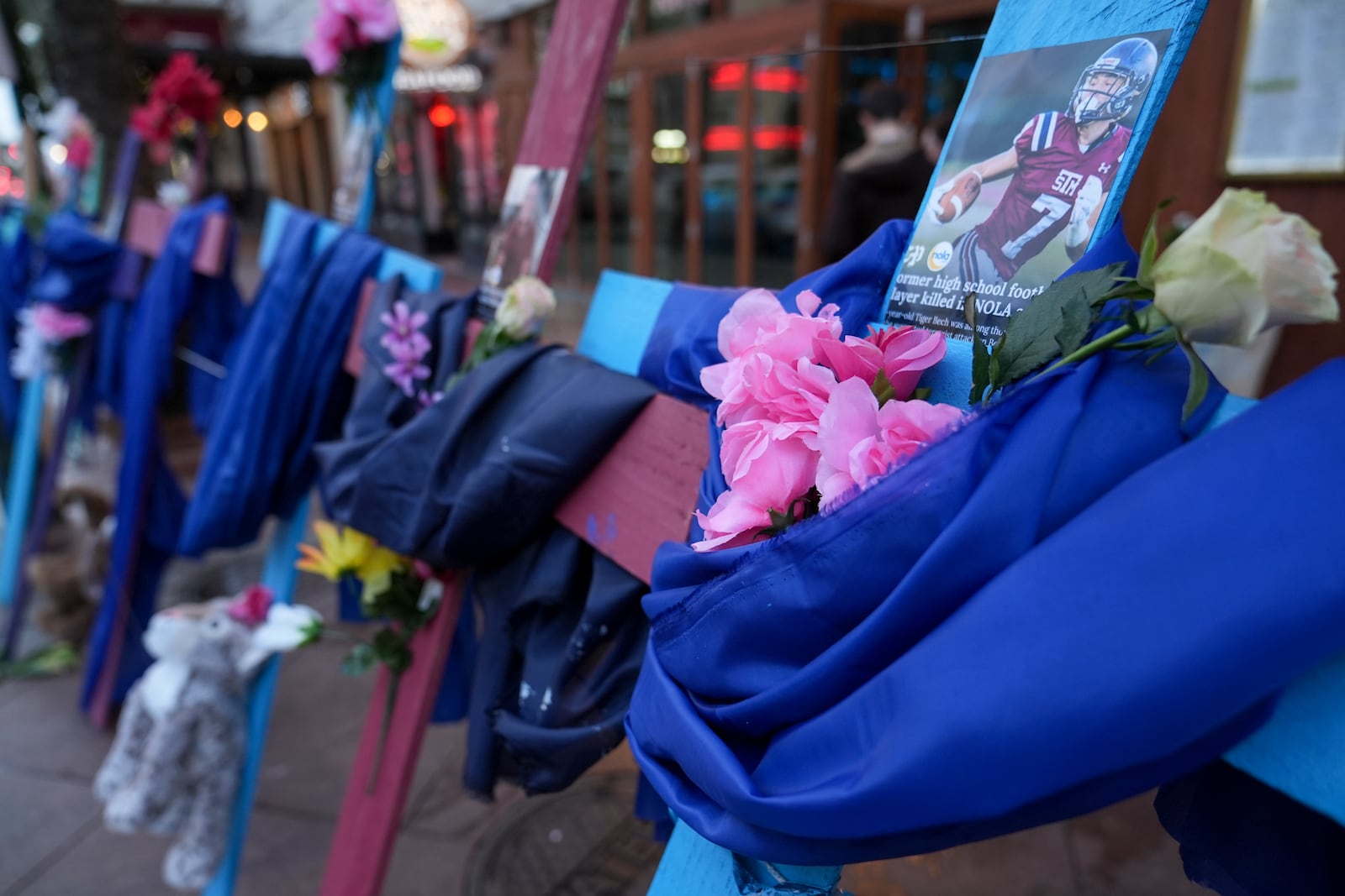 A memorial to the victims of a deadly truck attack is seen on Canal Street in the French Quarter, Friday, Jan. 3, 2025, in New Orleans. (AP Photo/George Walker IV)