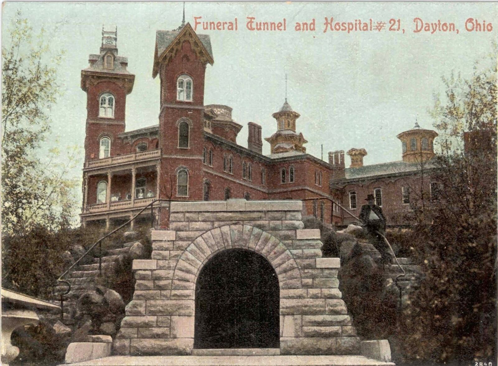 Exit from the funeral tunnel at the National Home for Disabled Volunteer Soldiers in Dayton (Dayton VA) shown on a postcard around 1890. The tunnel ran from the basement morgue to the cemetery. DAYTON PUBLIC LIBRARY