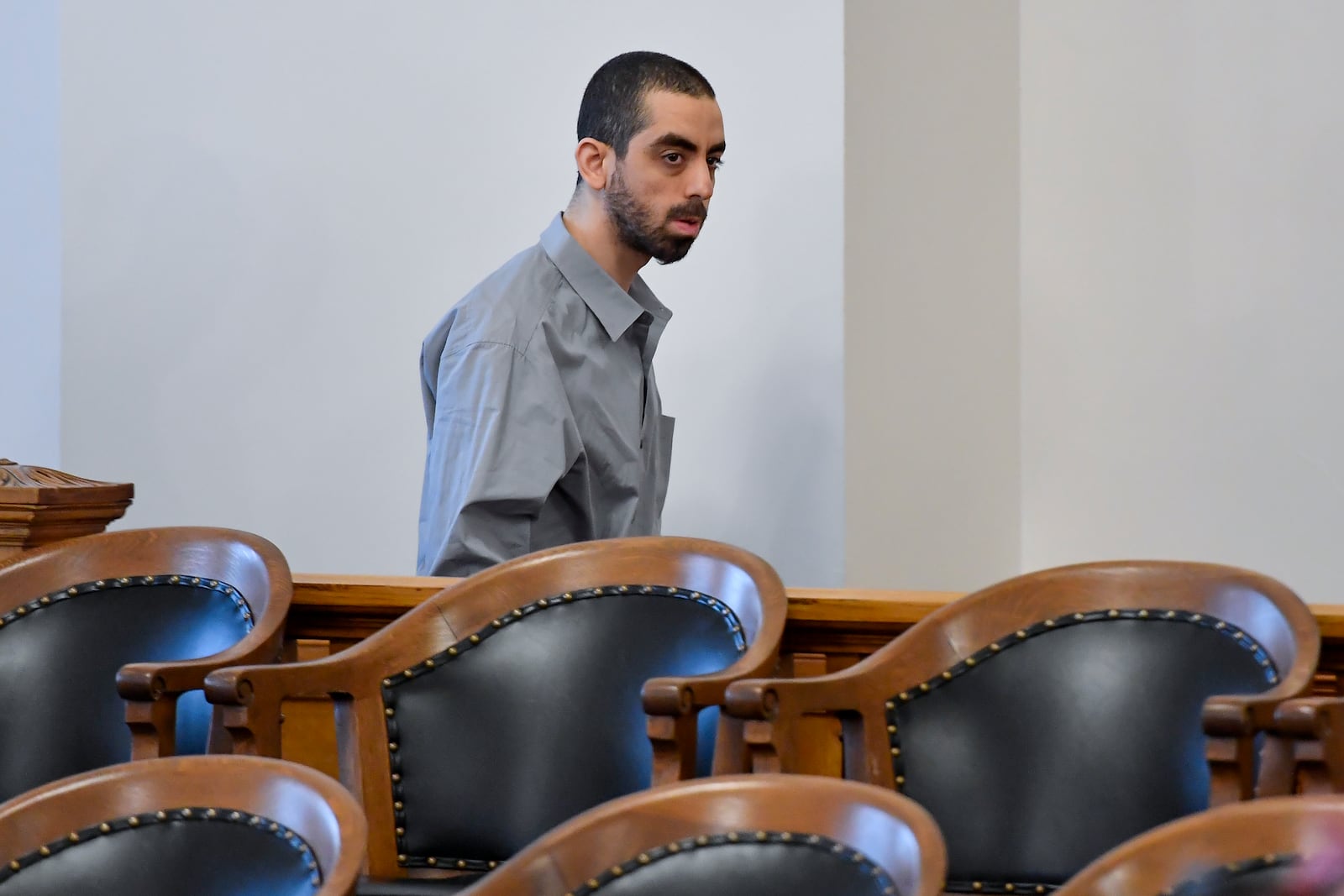 Hadi Matar, charged with severely injuring author Salman Rushdie in a 2022 knife attack, walks in to Chautauqua County court in Mayville, N.Y., Thursday, Feb. 20, 2025. (AP Photo/Adrian Kraus)