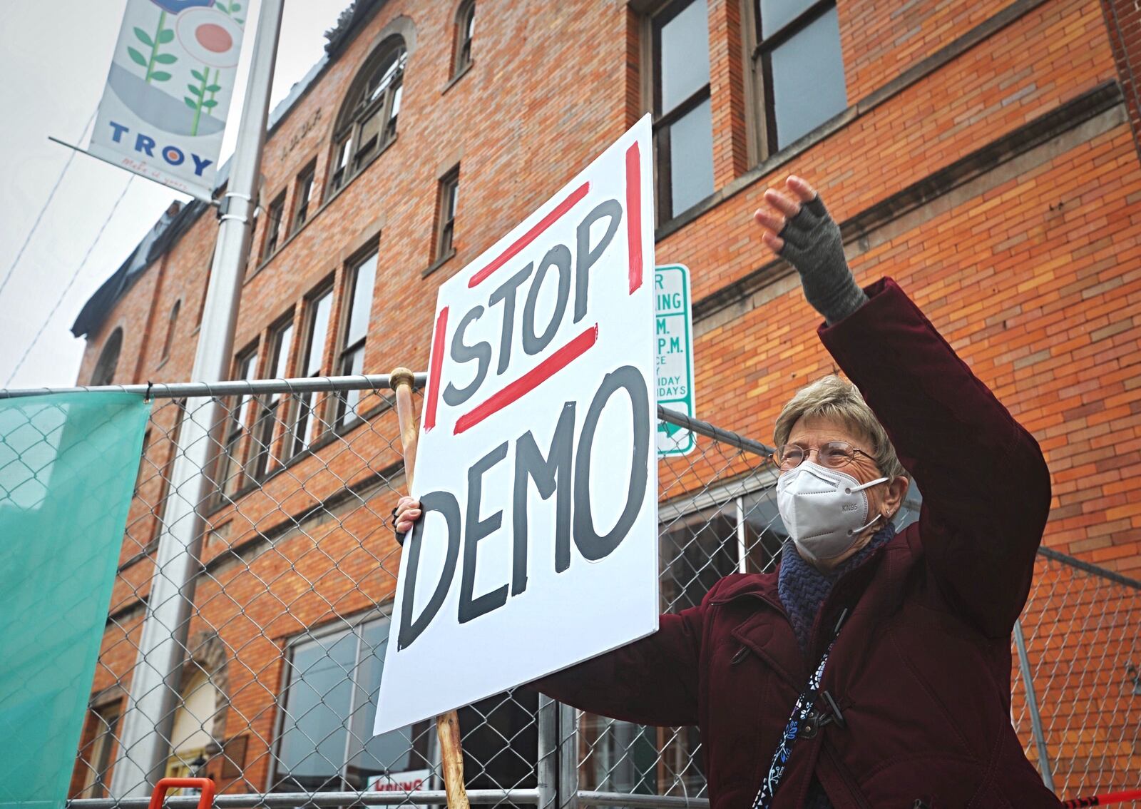 Troy resident Rosemary Jones protested the demolition of a Main Street building that housed an early county courthouse and an array of well-known businesses at 112-118 W. Main St.