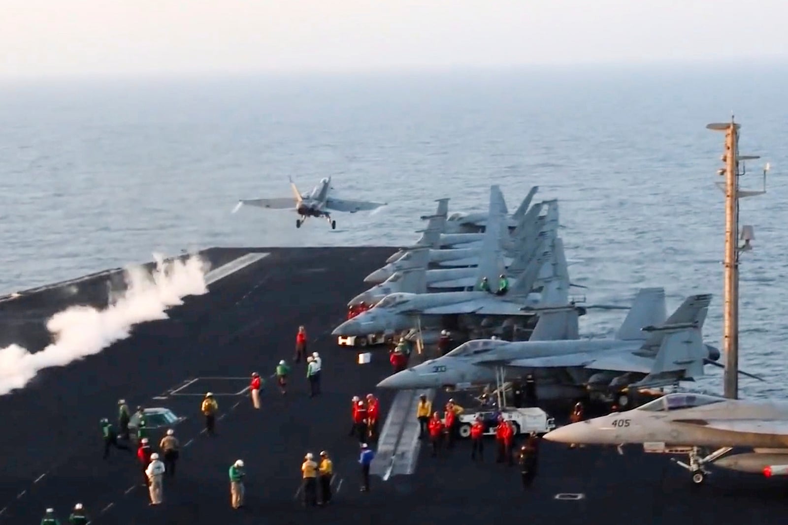 This image taken from video provided by the U.S. Navy shows an aircraft launching from a carrier in an undisclosed location before airstrikes in Sanaa, Yemen, Saturday, March 15, 2025. (U.S. Navy via AP)