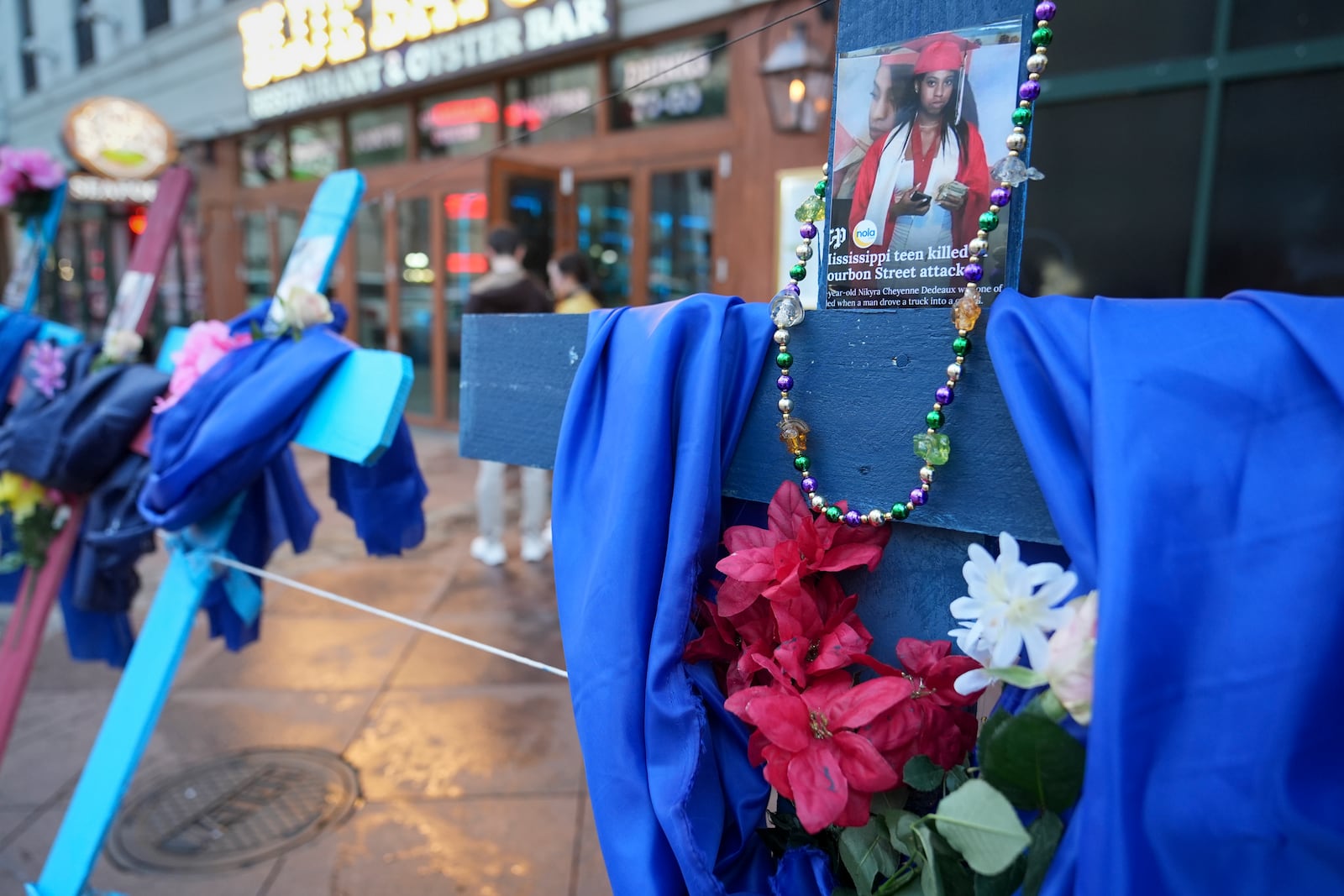 A memorial to the victims of a deadly truck attack is seen on Canal Street in the French Quarter, Friday, Jan. 3, 2025, in New Orleans. (AP Photo/George Walker IV)