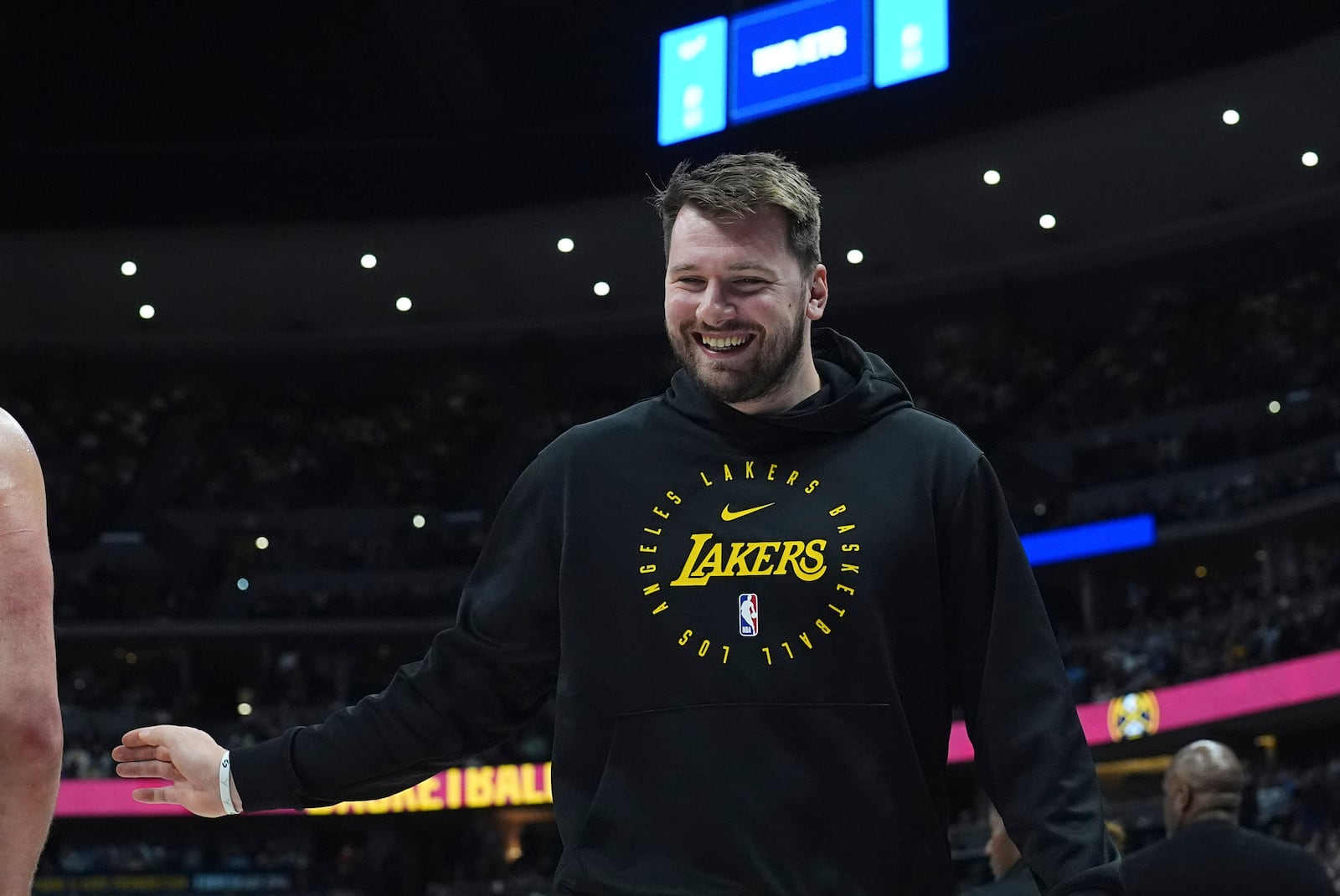 Los Angeles Lakers guard Luka Doncic heads back to the bench in the first half of an NBA basketball game against the Denver Nuggets, Friday, March 14, 2025, in Denver. (AP Photo/David Zalubowski)