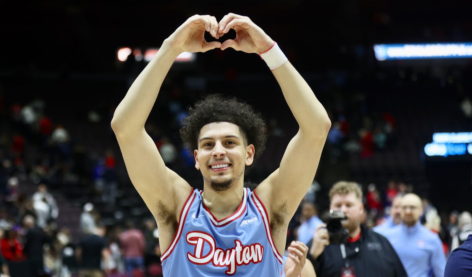 Dayton's Koby Brea celebrates a victory against Cincinnati on Saturday, Dec. 16, 2023, at the Heritage Bank Center in Cincinnati. David Jablonski/Staff