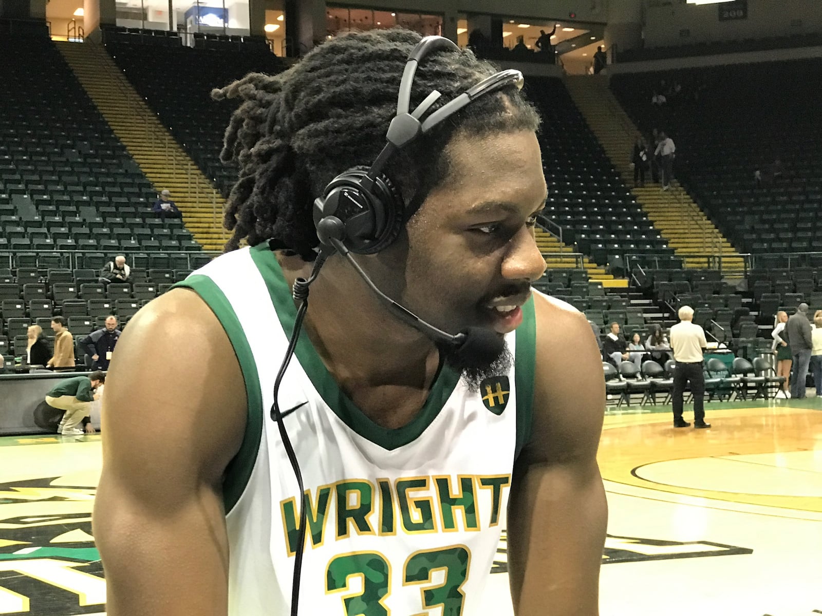 Wright State forward Michael Imariagbe does a radio interview with the Raiders broadcast team after making all 6 shots he took for 14 points in WSU’s 70-57 victory over Air Force Saturday night at the Nutter Center. Tom Archdeacon/CONTRIBUTED