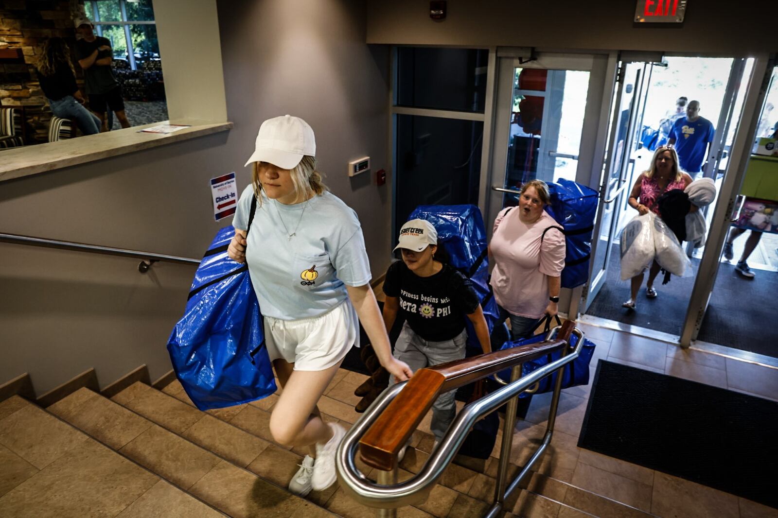 University of Dayton freshman move into Stuart Hall Friday August 18, 2023.  UD enrollment remains high this year, with more than 11,000 undergraduates, graduate, doctoral and law students. JIM NOELKER/STAFF