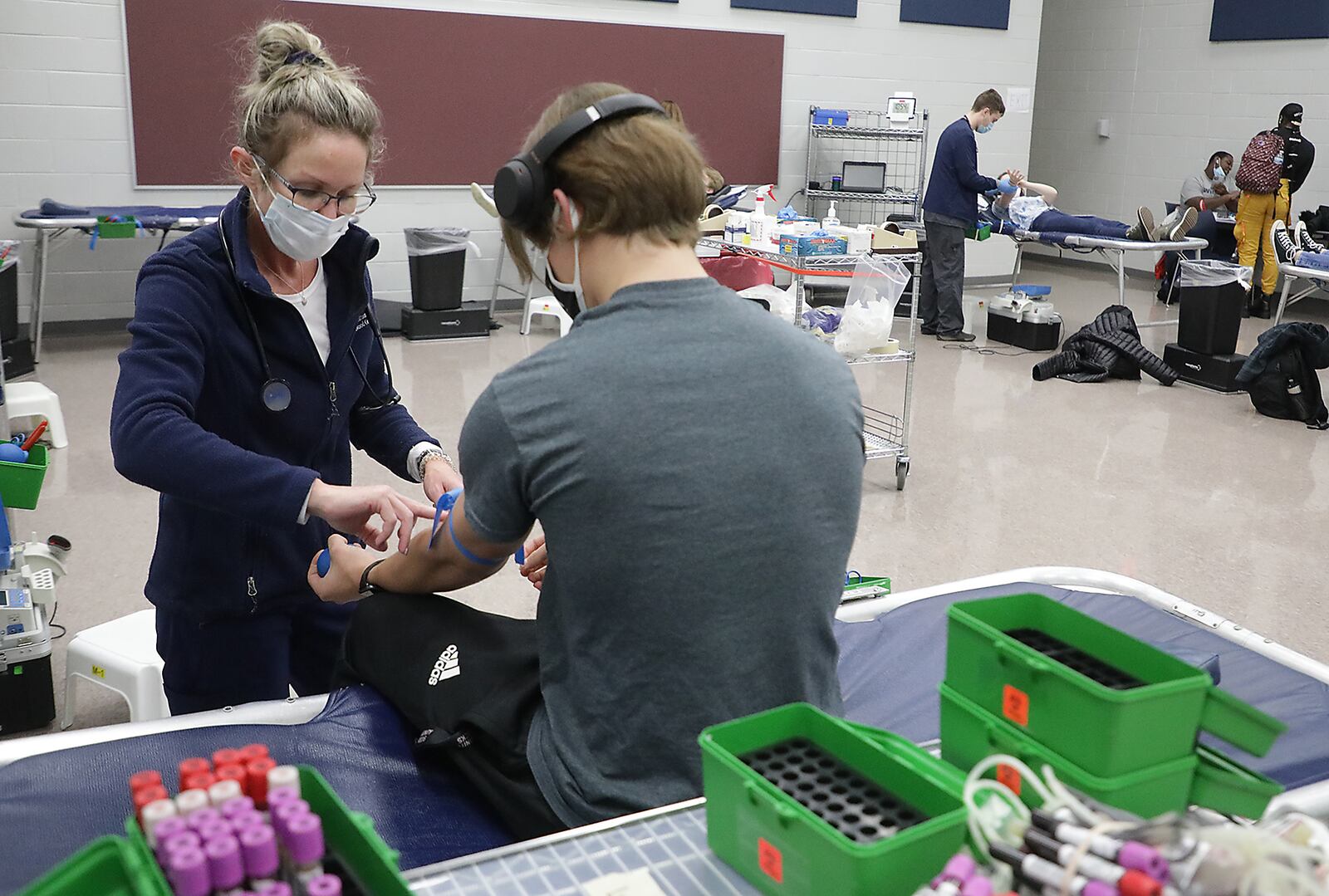 Students and staff at Springfield High School held a blood drive for the Community Blood Center. BILL LACKEY/STAFF