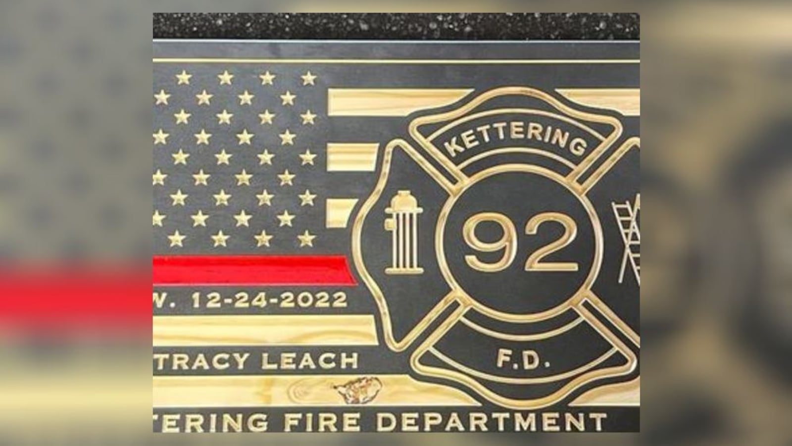 Five Rivers MetroParks Sgt. Brad Stock was responsible for a plaque in honoring Kettering Fire Department’s Tracy Leach, a firefighter/paramedic who died Dec. 24. It is located in a display case at the KFD Station 32, according to the fire department. CONTRIBUTED