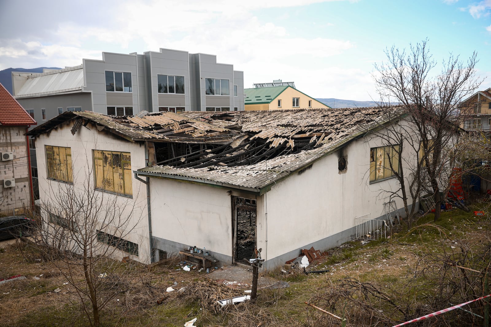 The building of a nightclub is damaged following a massive fire early Sunday in the town of Kocani, North Macedonia, Monday, March 17, 2025, (AP Photo/Armin Durgut)