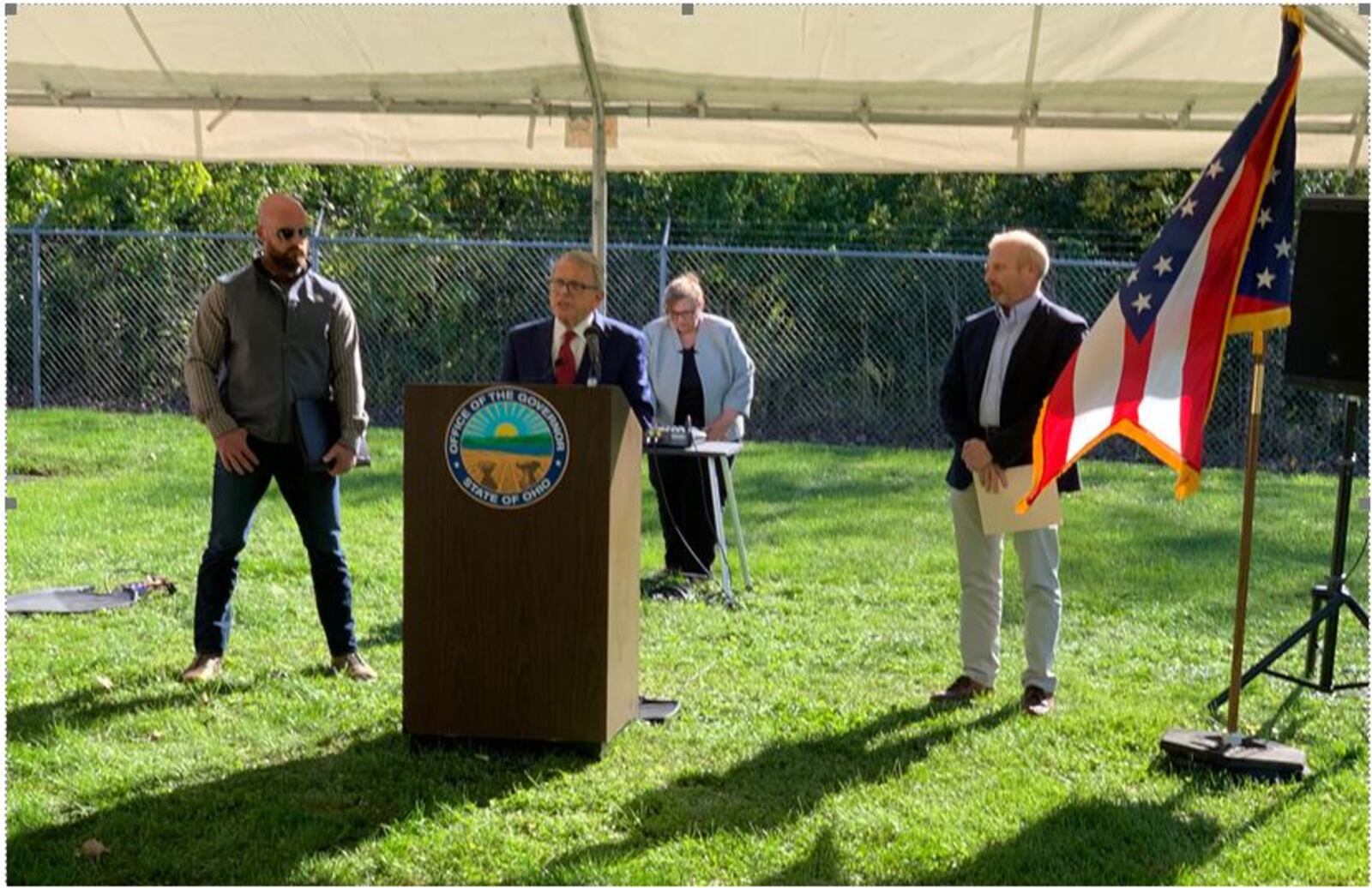 Ohio Gov. Mike DeWine, center, makes a few remarks during a grant award presentation Tuesday in Lebanon. DeWine announced the $4 million grant at the city's 50-year-old Glosser Road Wastewater Pumping Station which is in need of replacement. At left is Lebanon Vice Mayor Mark Messer and City Manager Scott Brunka is at right of DeWine. ED RICHTER/STAFF