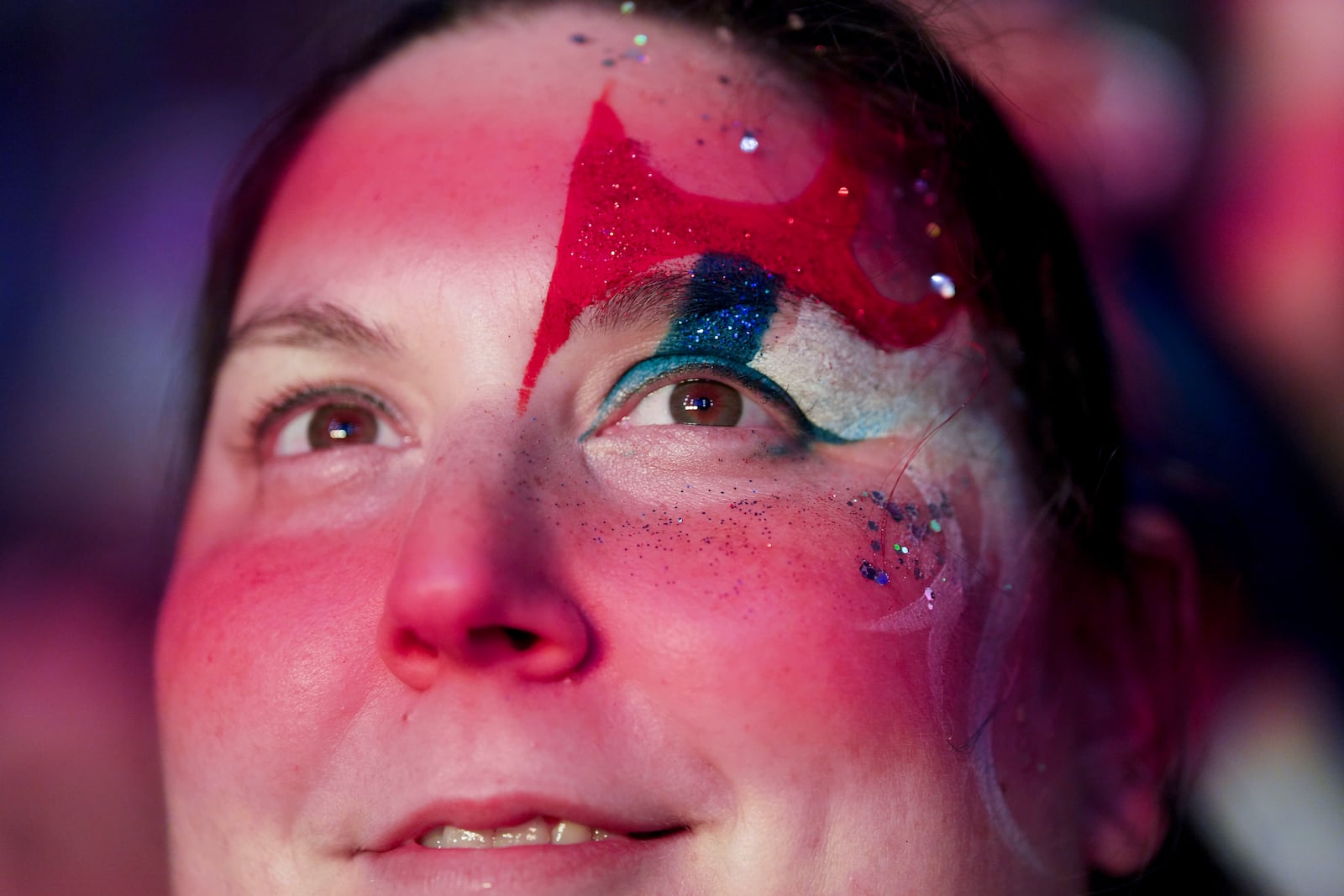 A supporter of Frente Amplio presidential candidate Yamandu Orsi attends a rally five days ahead of elections in Montevideo, Uruguay, Tuesday, Oct. 22, 2024. (AP Photo/Matilde Campodonico)