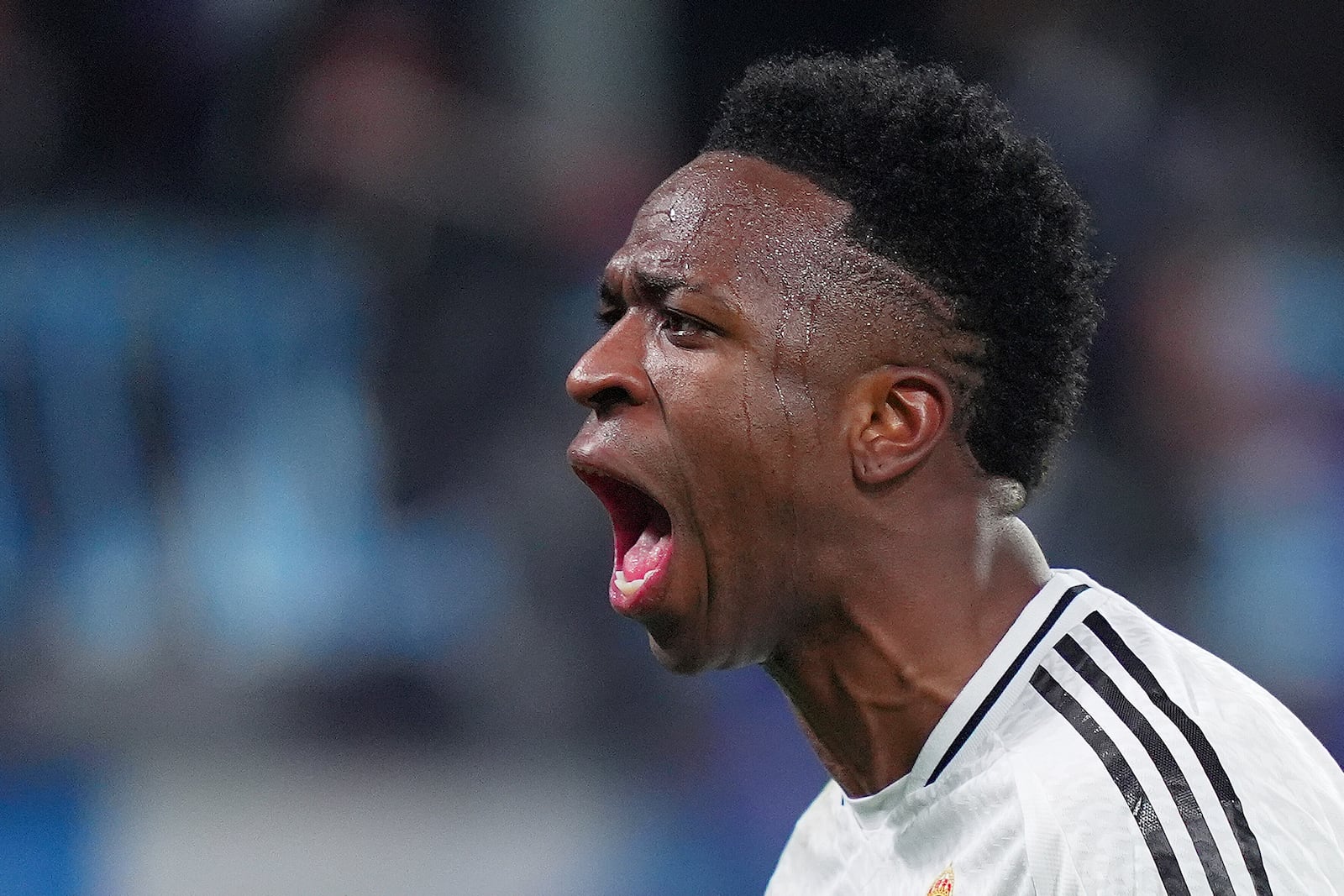 Real Madrid's Vinicius Junior celebrate after scoring during a Champions League opening phase soccer match between Atalanta and Real Madrid at the Bergamo's stadium, in Bergamo, Italy, Tuesday, Dec. 10, 2024. (Spada/LaPresse via AP)