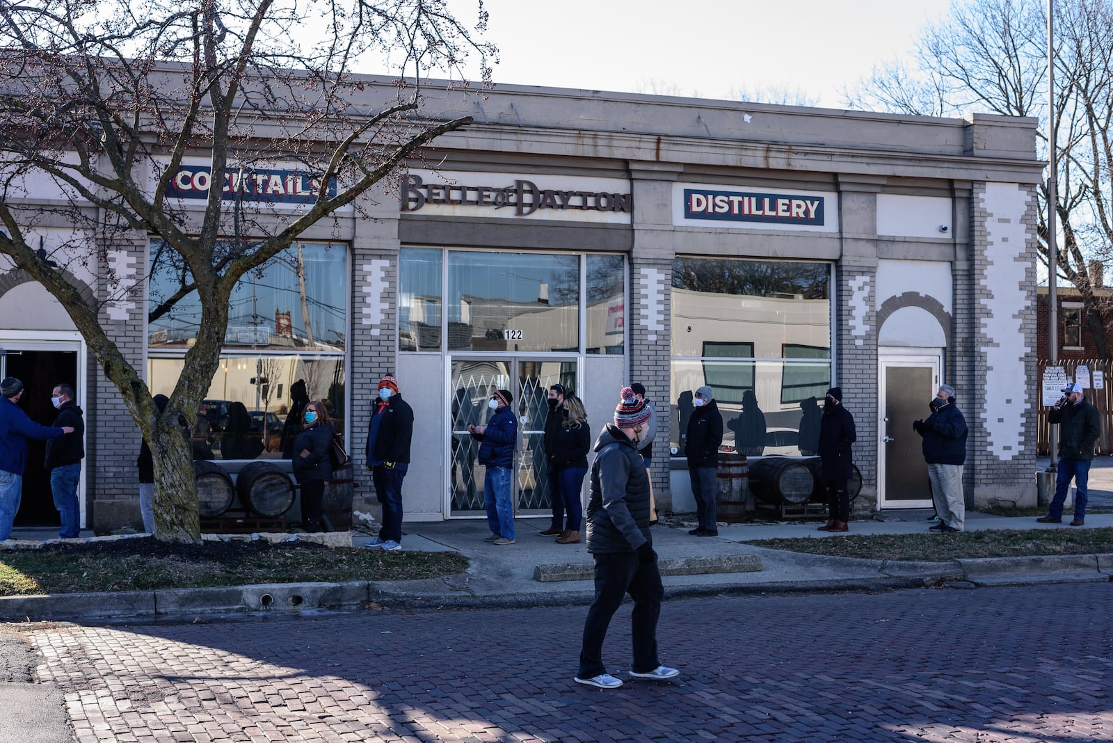 The Belle of Dayton Distillery, located on 122 Van Buren St. in Dayton’s Oregon Historic District celebrated the release of its Detrick Straight Rye Whiskey on Saturday, January 23, 2021 from 10 a.m. until 3 p.m. With a line wrapping all the way around to Clay St., every bottle of the limited release spirit was sold out by 8 p.m. during the distillery’s Van Buren Room cocktail bar hours. The Detrick Distilling Co. operated a distillery in Tippecanoe (present day Tipp City) before Prohibition plus had a shipping and receiving office in downtown Dayton. Members of the Detrick family were present for the release. TOM GILLIAM / CONTRIBUTING PHOTOGRAPHER