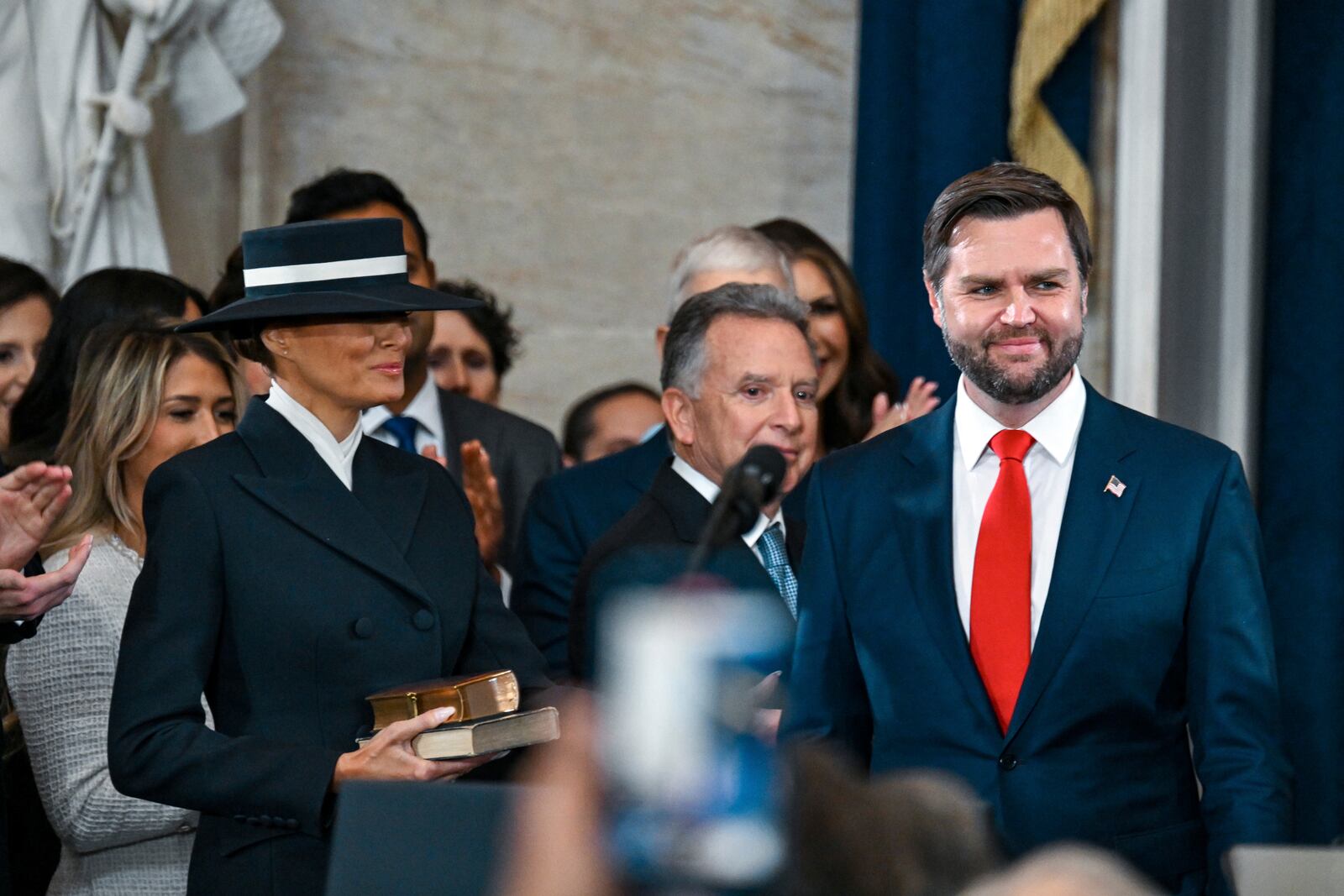 Melania Trump, left, and Vice President-elect JD Vance arrive before the 60th Presidential Inauguration in the Rotunda of the U.S. Capitol in Washington, Monday, Jan. 20, 2025. (Kenny Holston/The New York Times via AP, Pool)