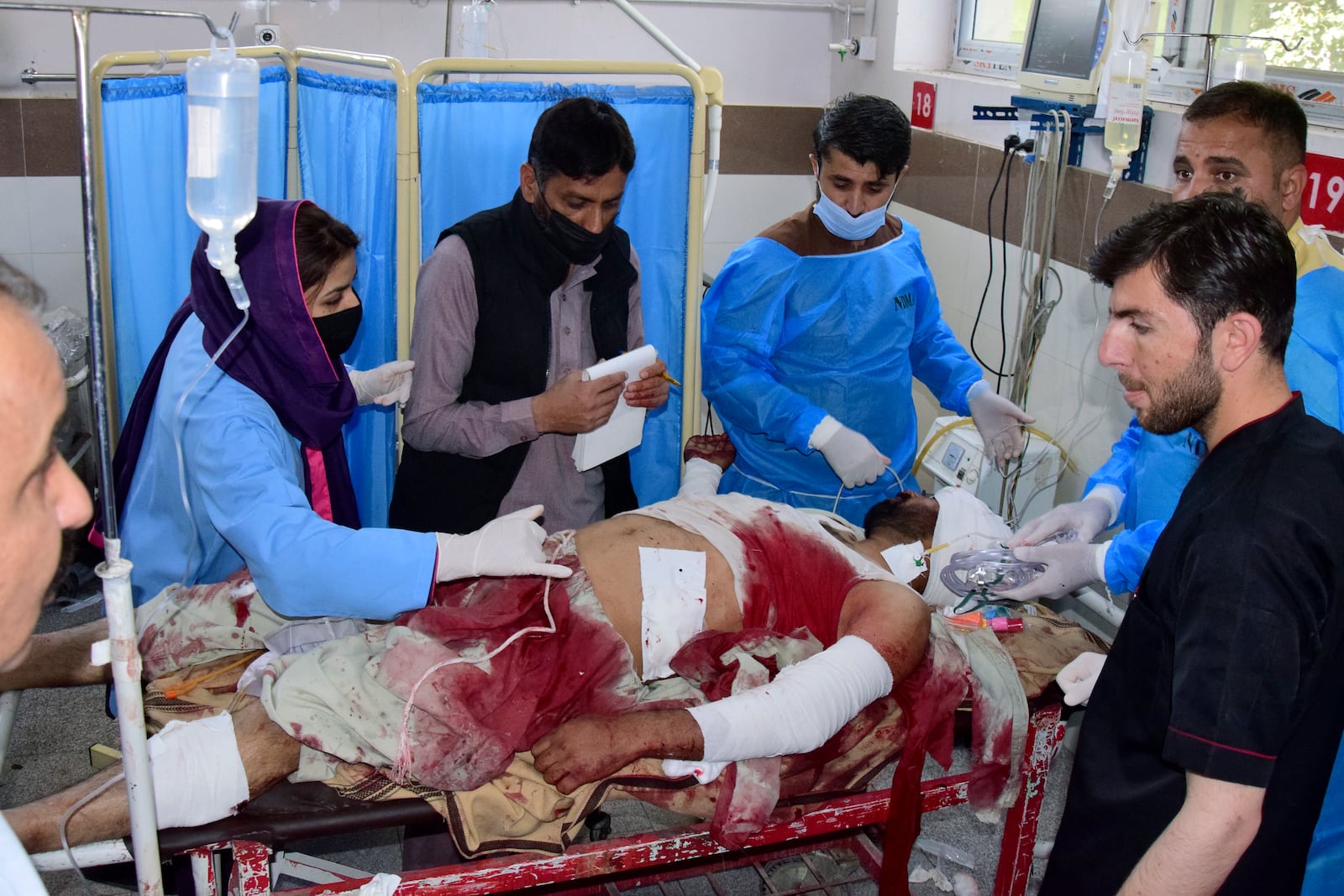 An injured victim of bomb explosion at railway station, is treated at a hospital in Quetta, southwestern Pakistan, Saturday, Nov. 9, 2024. (AP Photo/Arshad Butt)