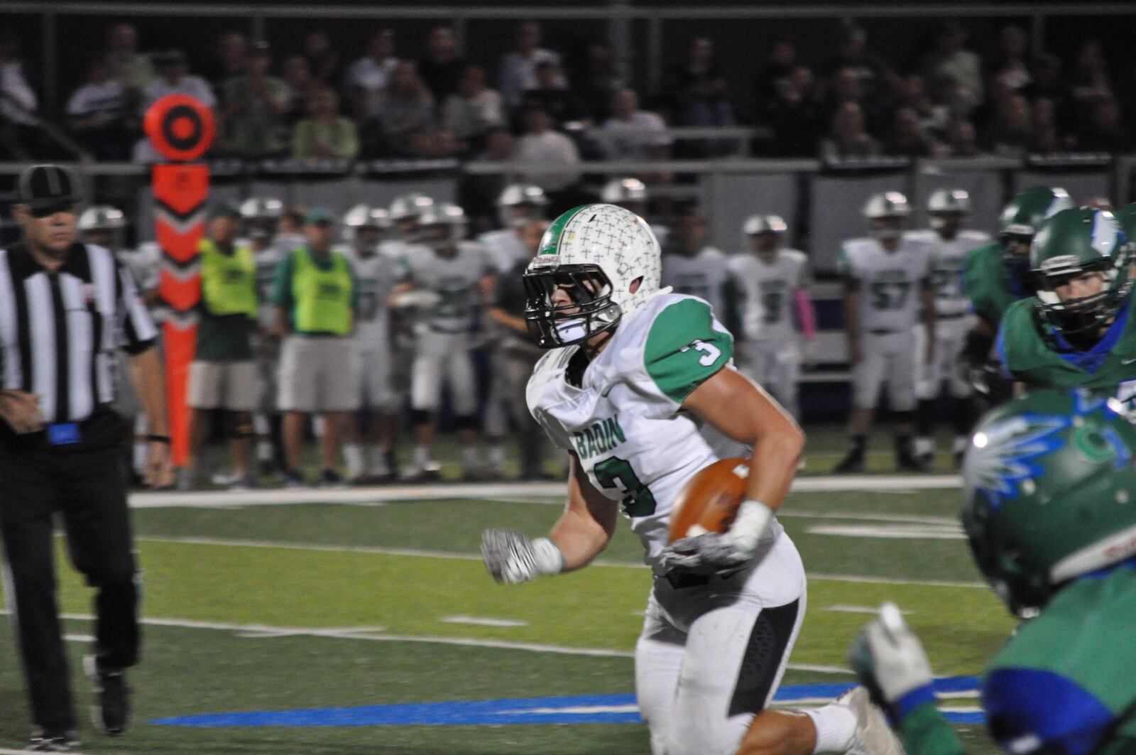 Badin’s Kegen Rogers breaks into the open during Friday night’s game against Chaminade Julienne at Roger Glass Stadium in Dayton. CONTRIBUTED PHOTO BY NICK DUDUKOVICH