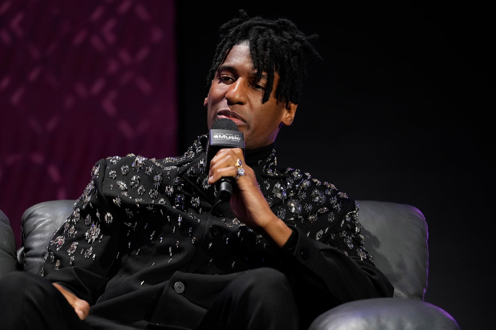 Super Bowl LIX Pregame performer Jon Batiste speaks during a news conference, Thursday, Feb. 6, 2025, in New Orleans ahead of the NFL Super Bowl 59 football game between the Philadelphia Eagles and the Kansas City Chiefs. (AP Photo/Matt York)