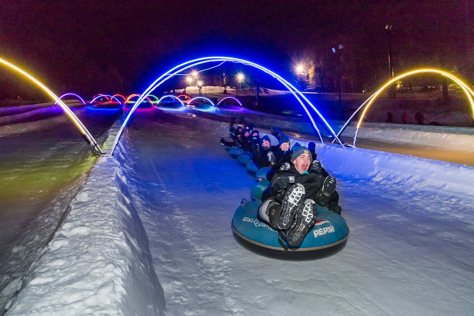 Beginning Dec. 13, guests to Snow Trails can expect to experience glow tubing.