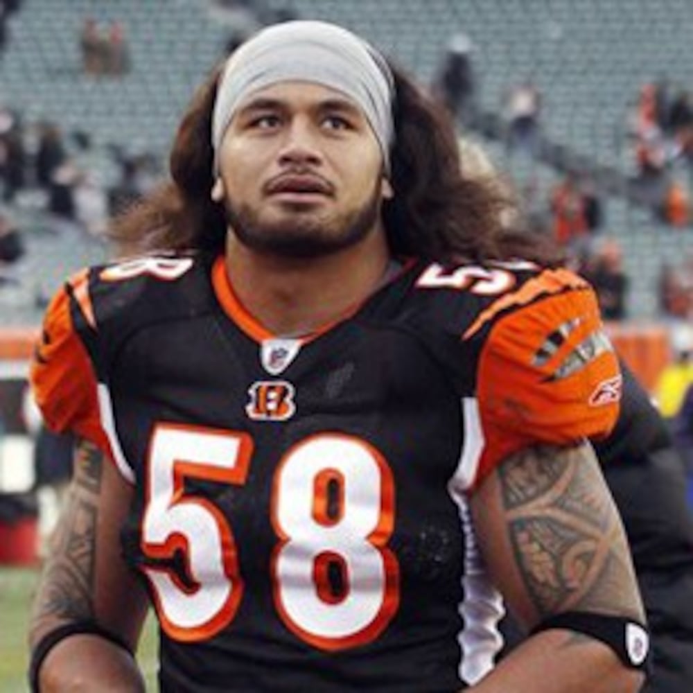 FILE - In this Sunday, Dec. 6, 2009 file photo, Cincinnati Bengals linebacker Rey Maualuga walks off the field after an NFL football game in Cincinnati. Police in northern Kentucky arrested Maualuga early Friday, Jan. 29, 2010 on charges of drunken and careless driving. (AP Photo/Tony Tribble, File)