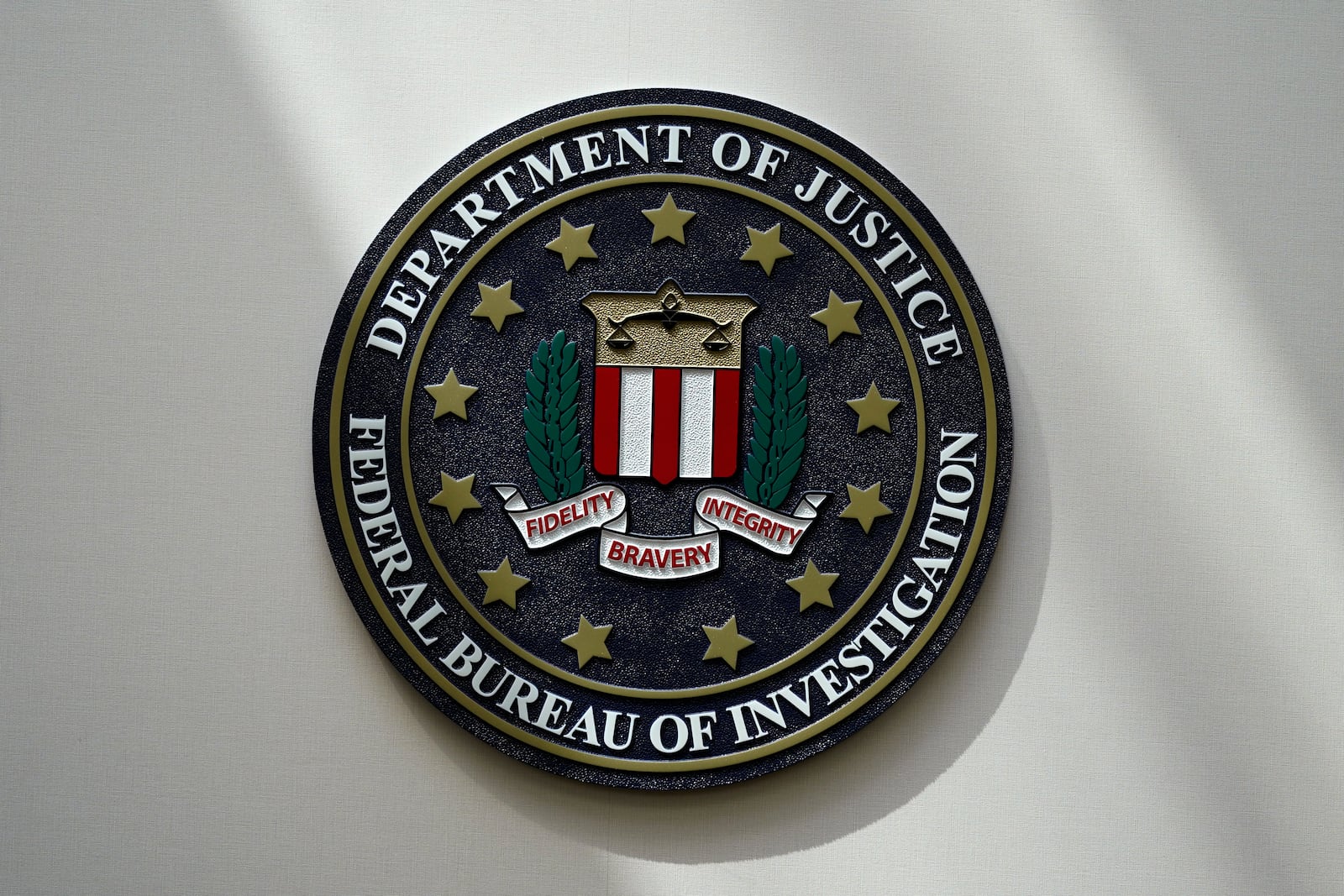 FILE - The FBI seal is pictured in Omaha, Neb., Aug. 10, 2022. (AP Photo/Charlie Neibergall, File)