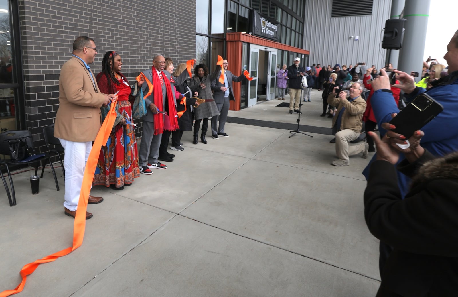 A ribbon cutting ceremony was held for Homefull’s new Healthy Living in West Dayton project. BILL LACKEY/STAFF