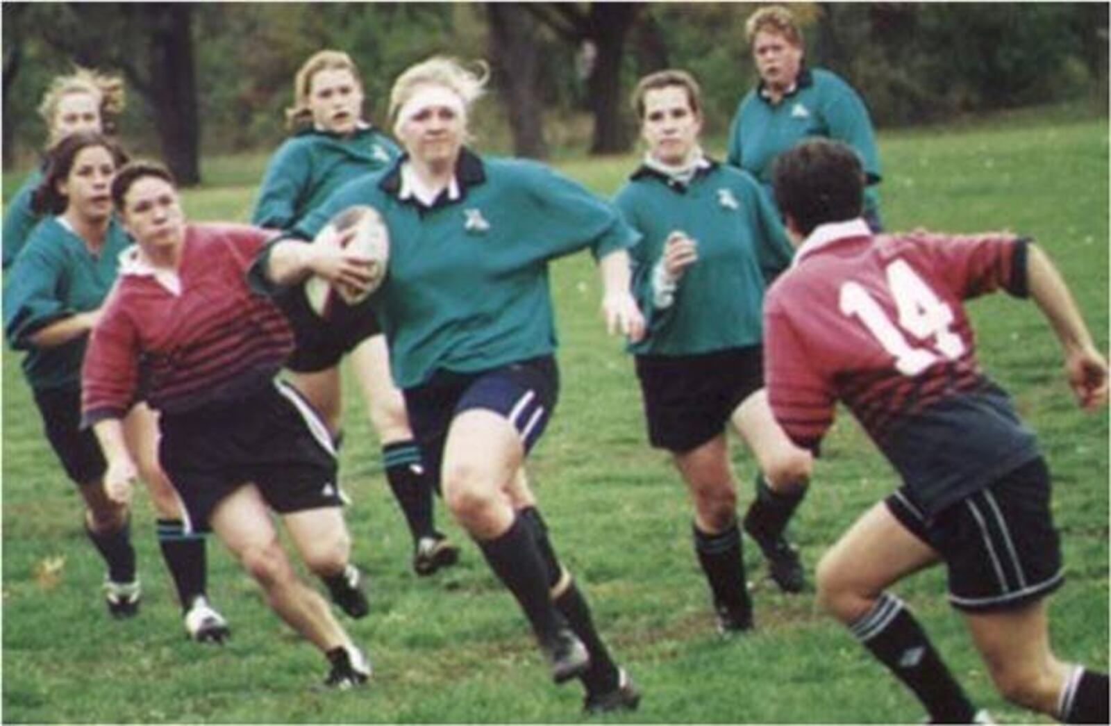 Melissa Fortener (with ball) playing rugby at Ohio University. She later played for the Cincy-Dayton Rugby club and the Cincinnai Kelts Rugby team. CONTRIBUTED