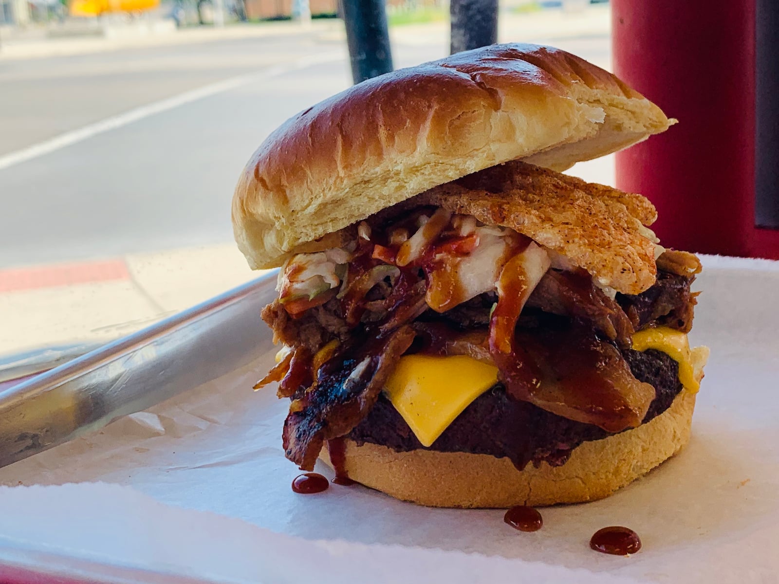 The second annual Dayton Burger Week begins on Aug. 5. Pictured:  a burger from  Smokin Bar-B-Que.