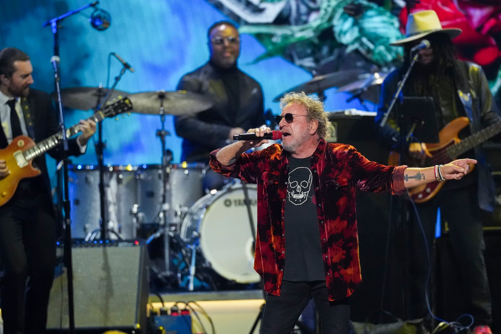 Sammy Hagar, center, performs during the MusiCares Person of the Year gala honoring The Grateful Dead on Friday, Jan. 31, 2025, in Los Angeles. (AP Photo/Chris Pizzello)