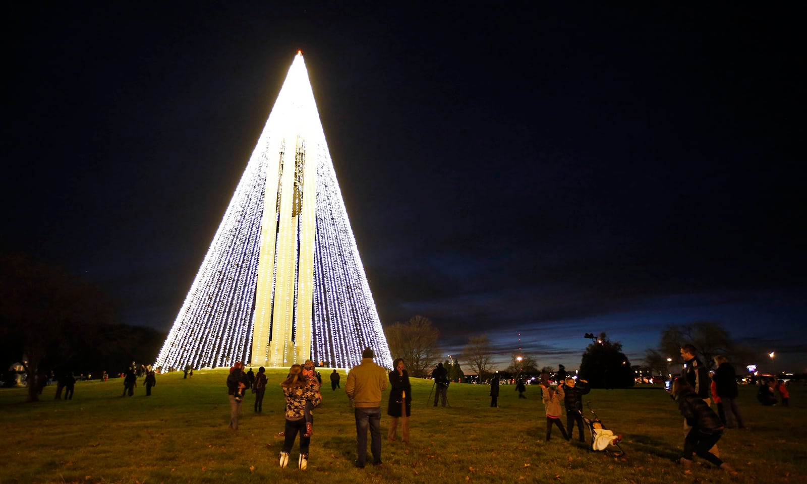 Dayton History has transformed the Deeds Carillon at Carillon Park into a huge lighted Christmas Tree. The big tree was illuminated on Tuesday evening. TY GREENLEES / STAFF