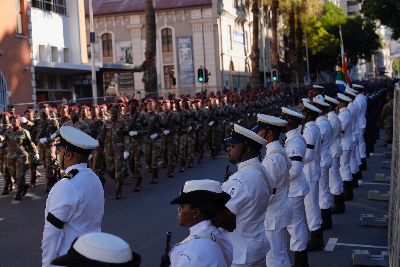 South African soldiers and veterans line up the street leading to Cape Town's city hall where South African President Cyril Ramaphosa will deliver his annual state of the union address, Thursday, Feb. 6, 2025. (AP Photo/Nardus Engelbrecht)