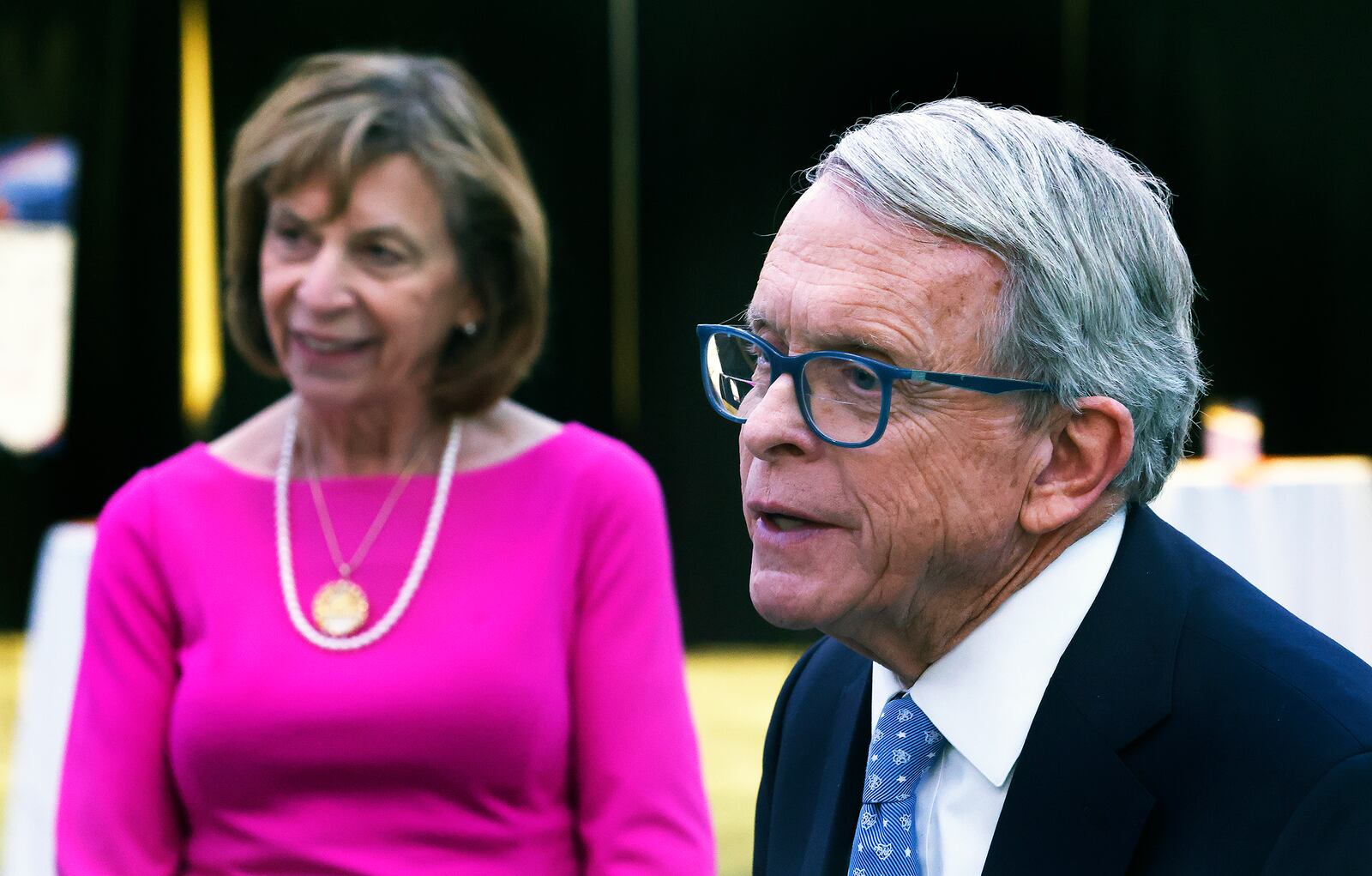 Ohio Gov. Mike DeWine with first lady Fran DeWine speaks Wednesday, Feb. 5, 2025 after his public remarks at the Dayton Development Coalition's annual meeting at the Dayton Convention Center. MARSHALL GORBY\STAFF